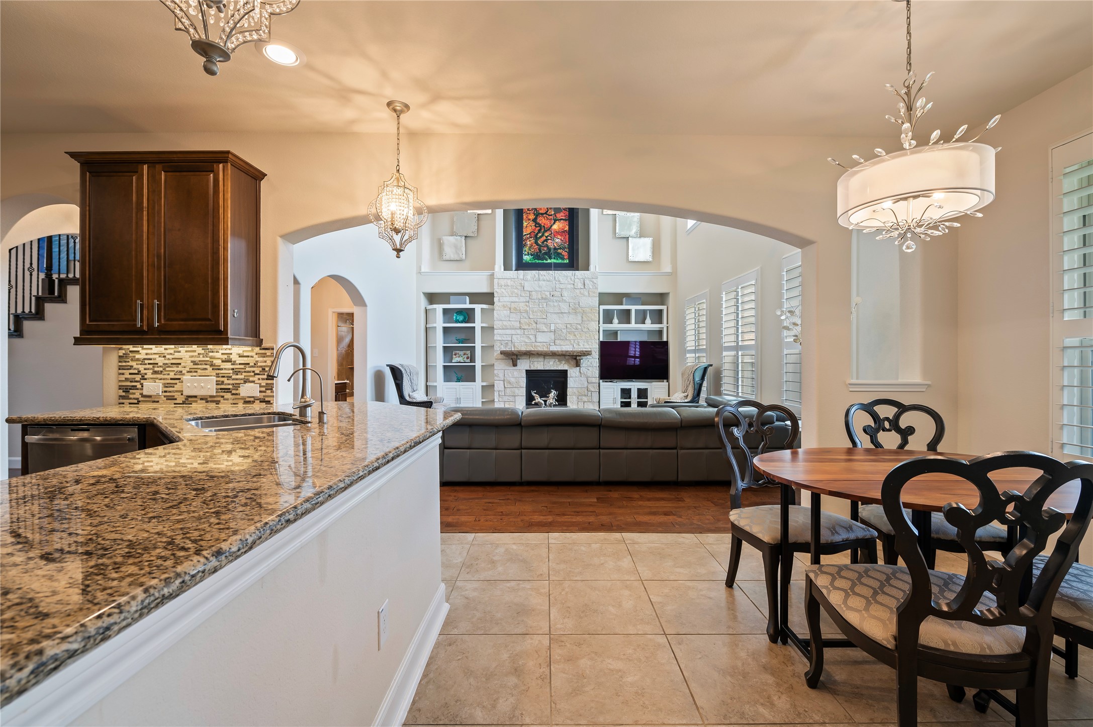 Another view of the desirable open concept Wellington floor plan. Kitchen tiled recently professional cleaned upon seller's move-out.
