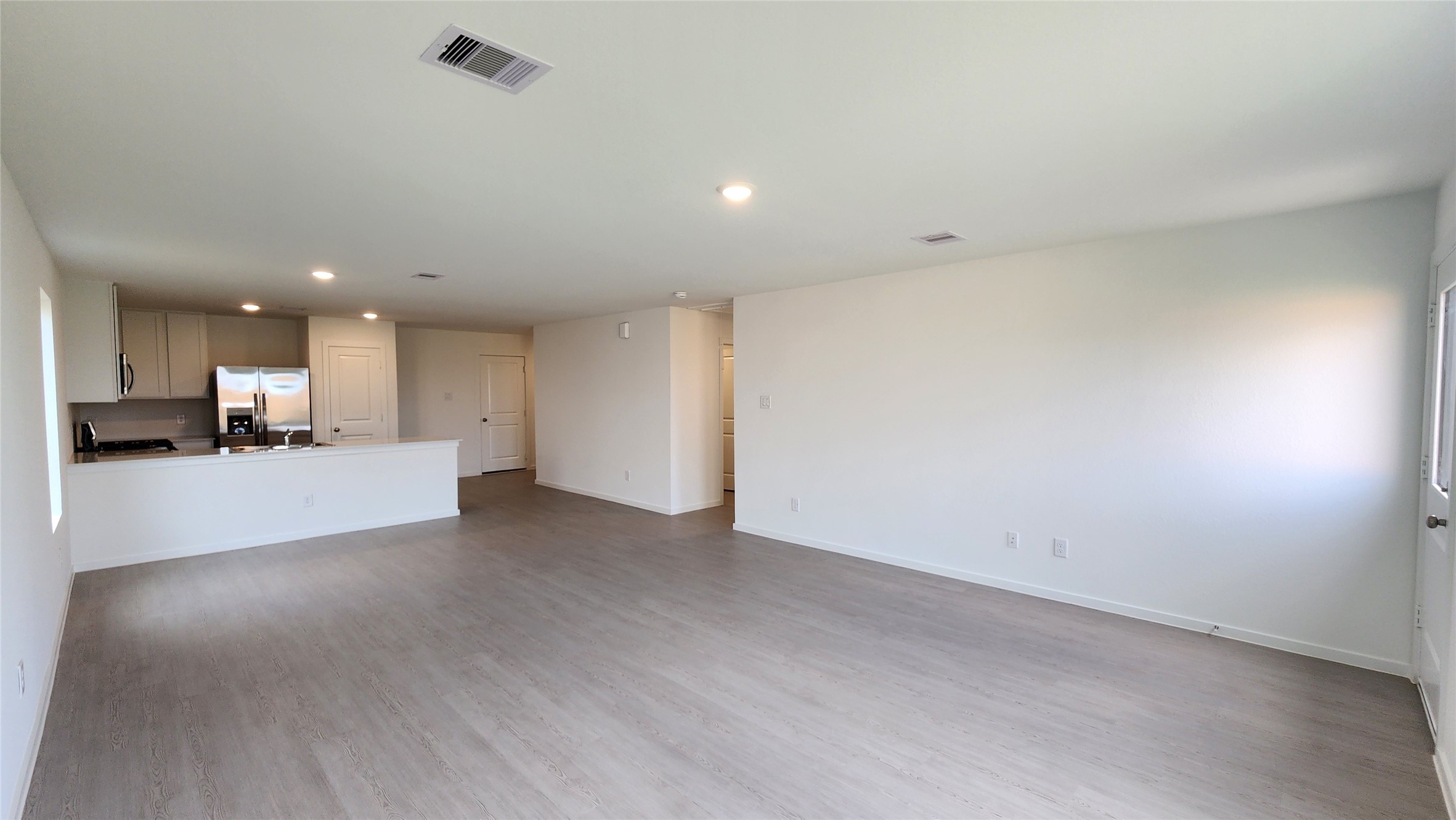 Family room to Dining and Kitchen