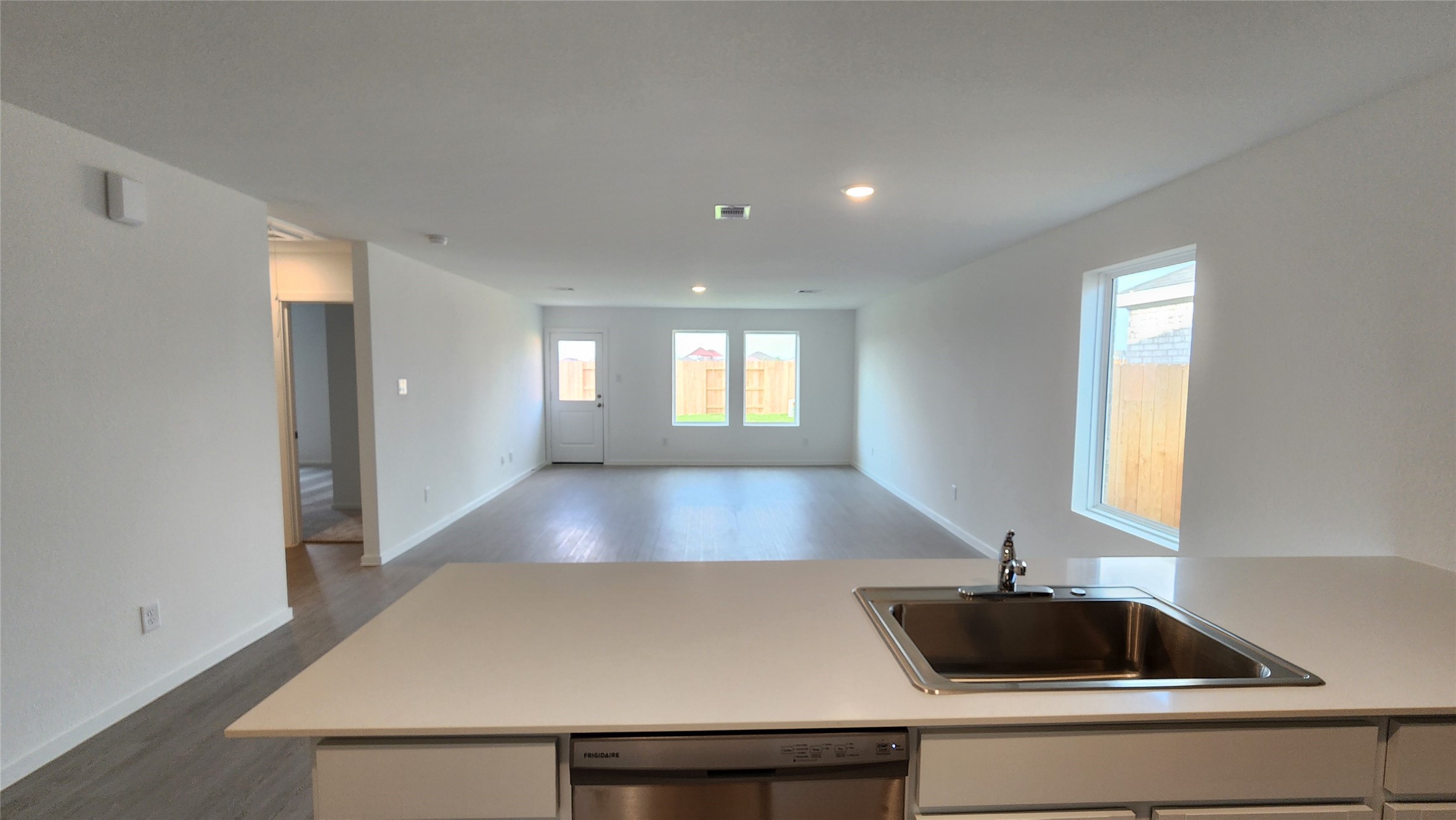 Kitchen to Dining and Family Room Kitchen to Dining and Family Room
