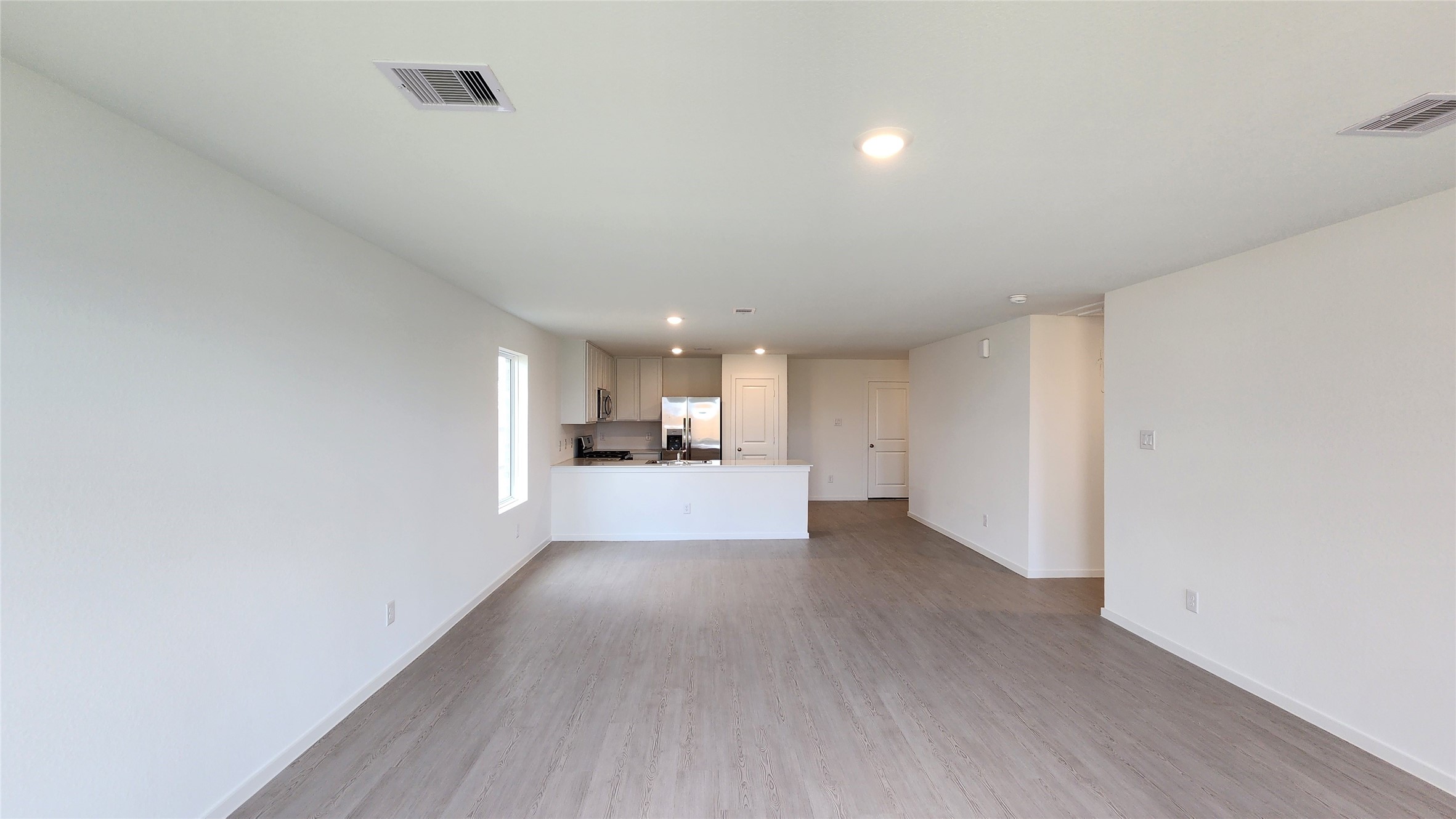 Family room to Dining and Kitchen Family room to Dining and Kitchen
