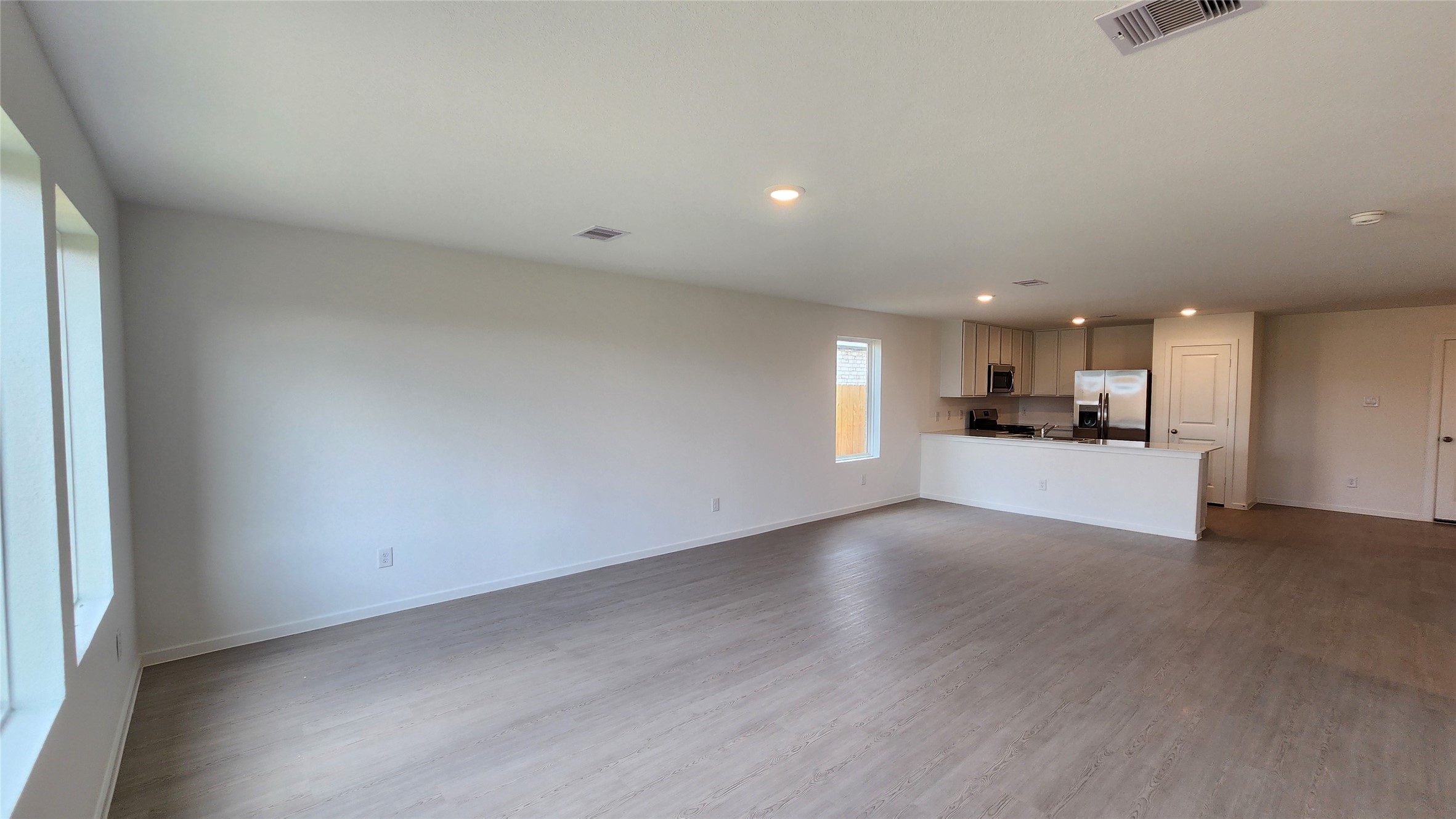 Family room to Dining and Kitchen