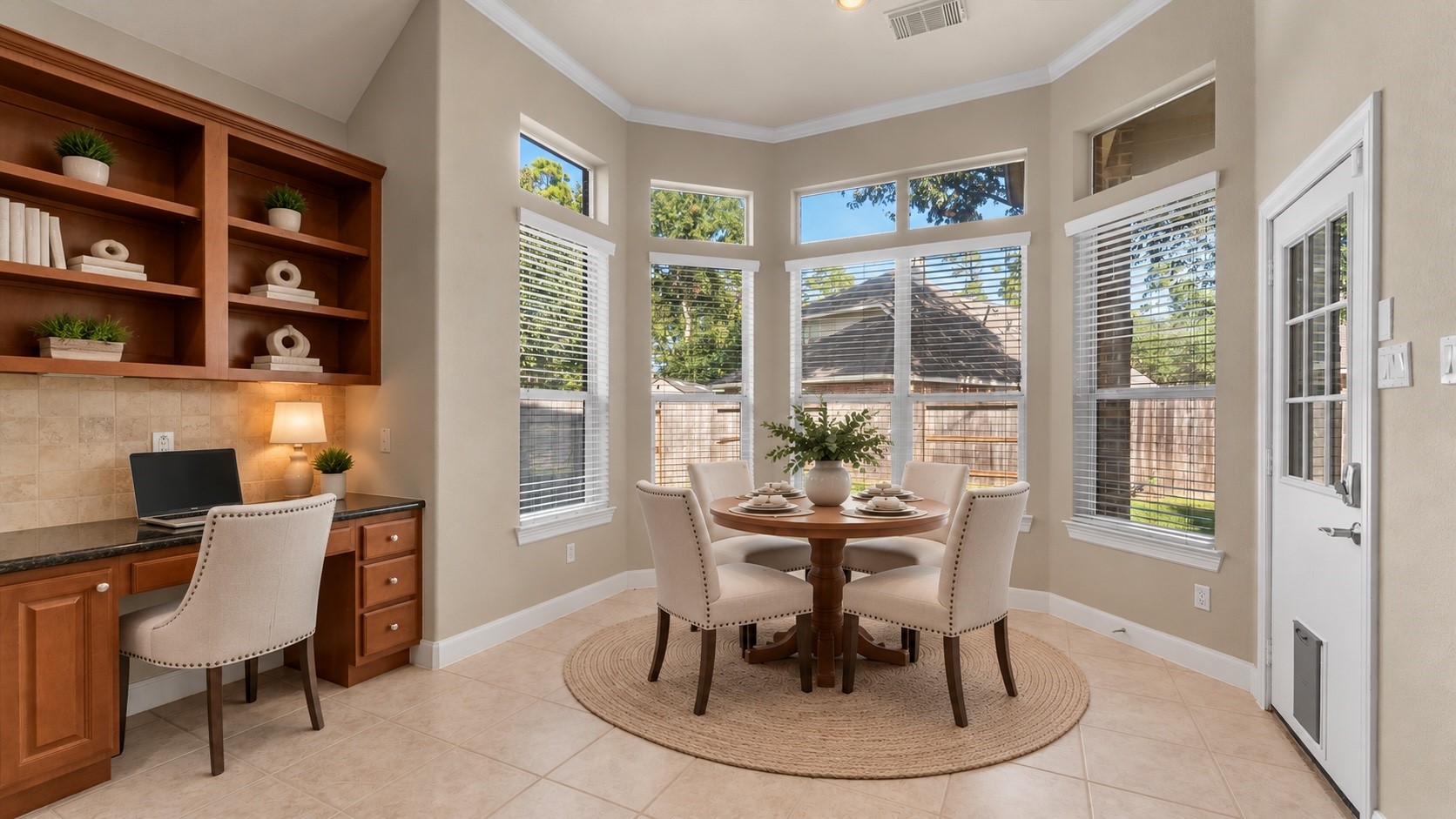 Virtually staged breakfast room.