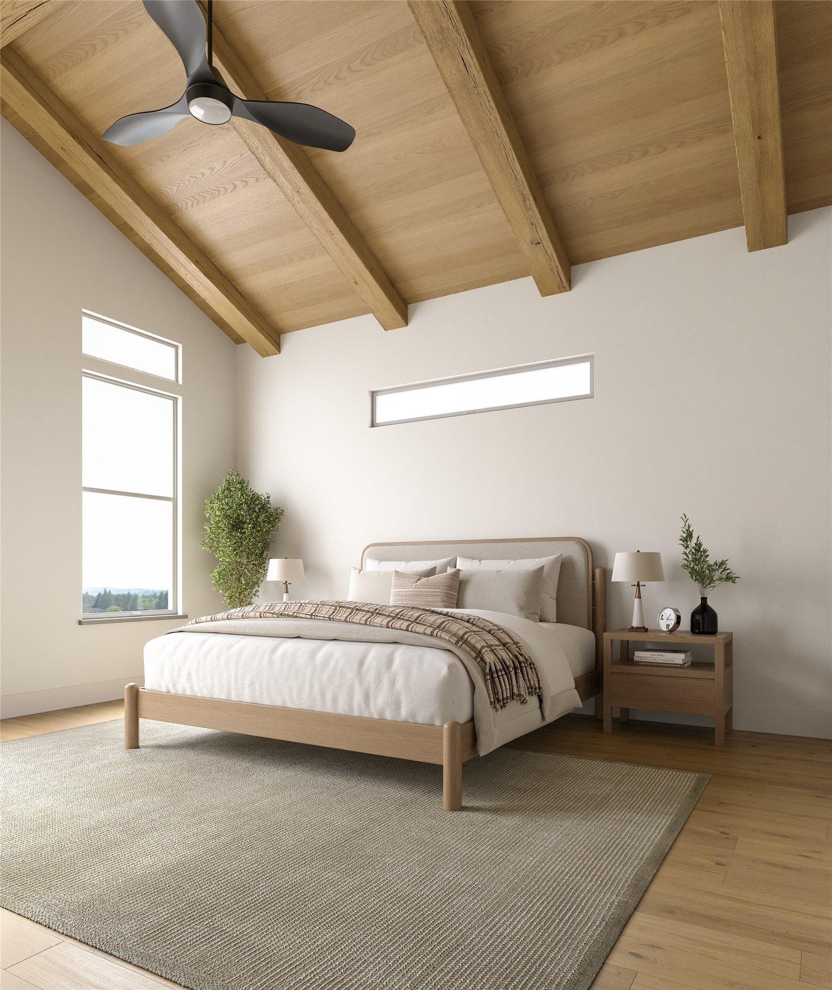 Spacious primary bedroom on the third floor featuring elegant wood-vaulted ceilings.