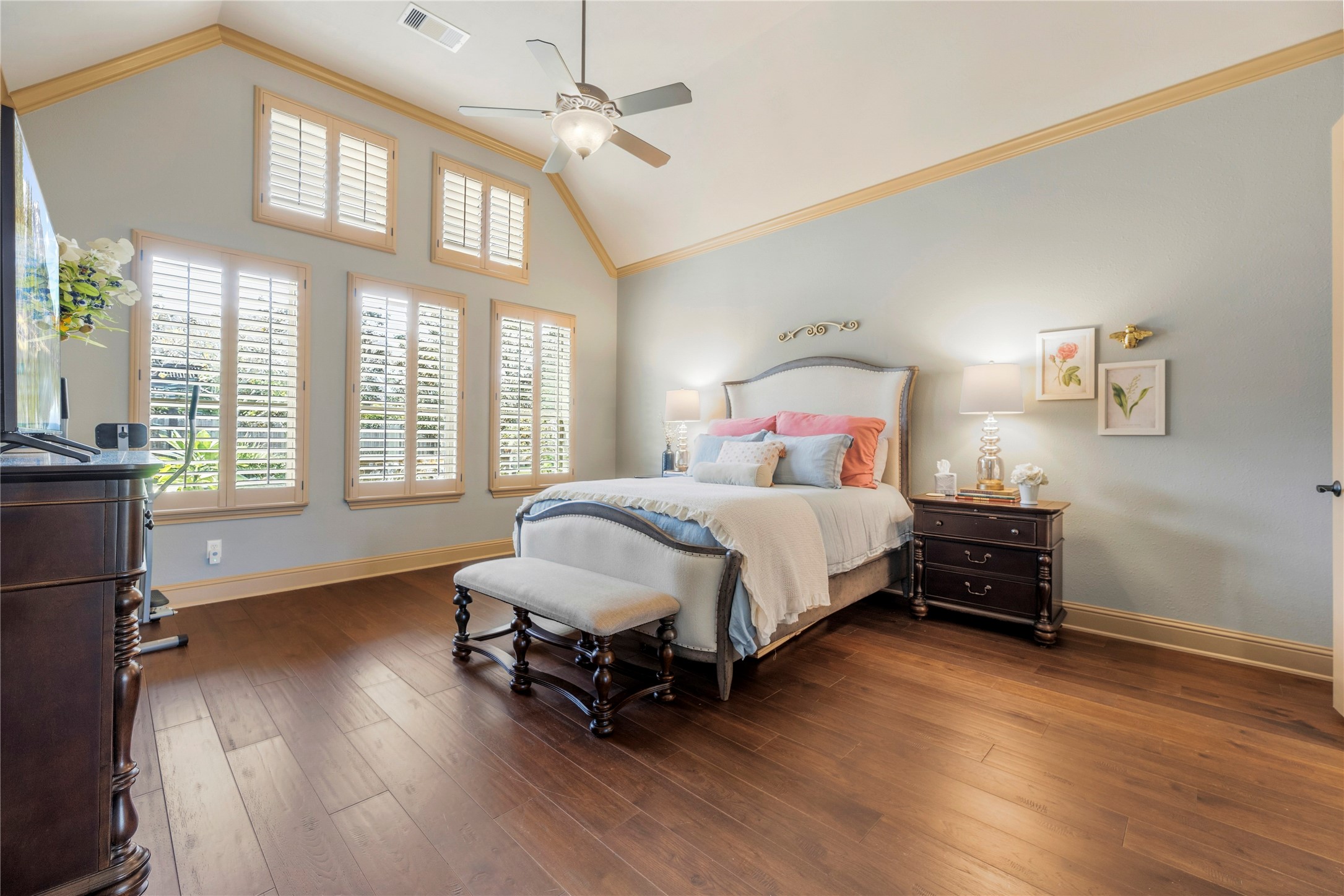Primary bedroom, showcasing the beautiful windows and spacious layout.