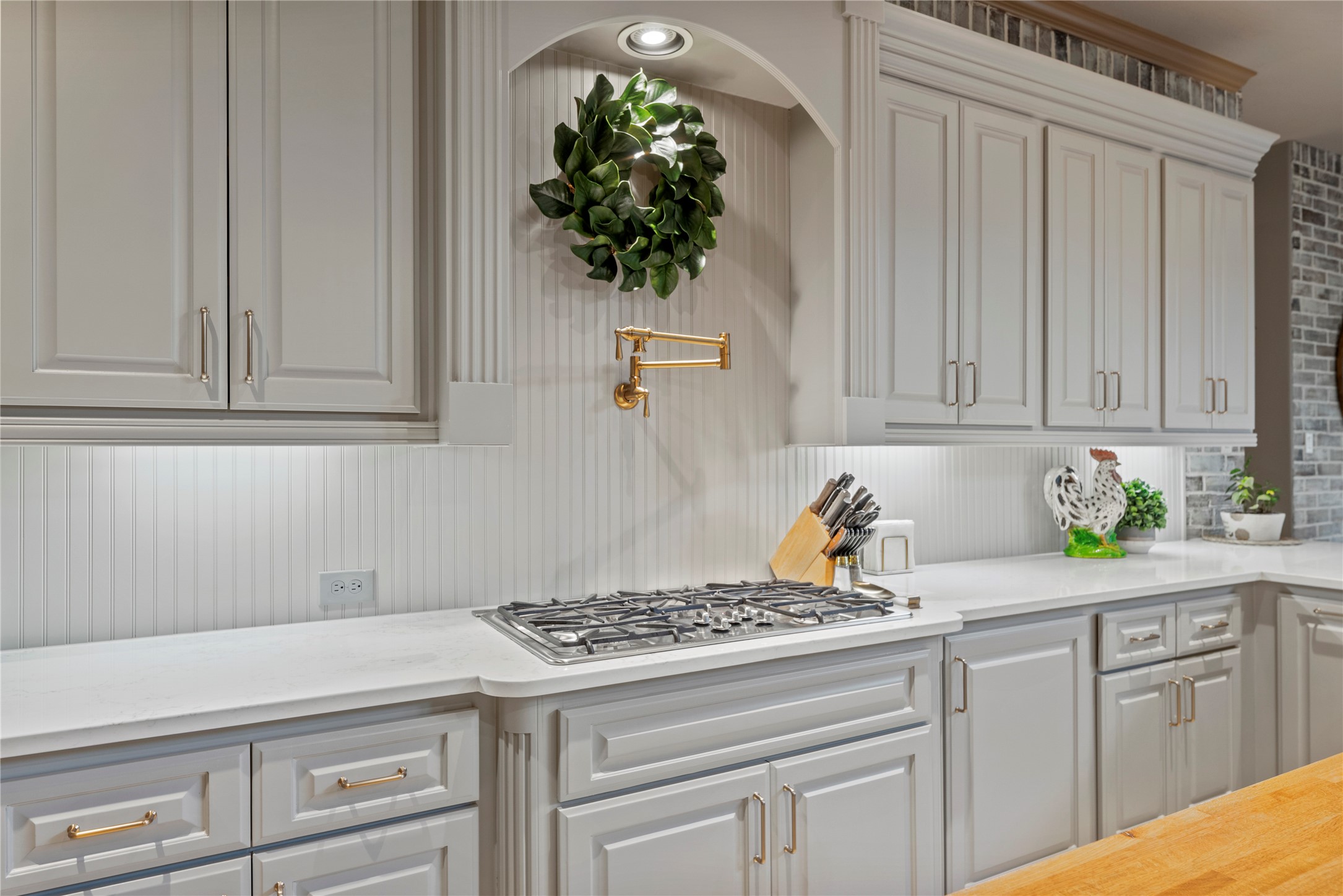 Additional view of the kitchen and pot filler to make life easier for the chef.