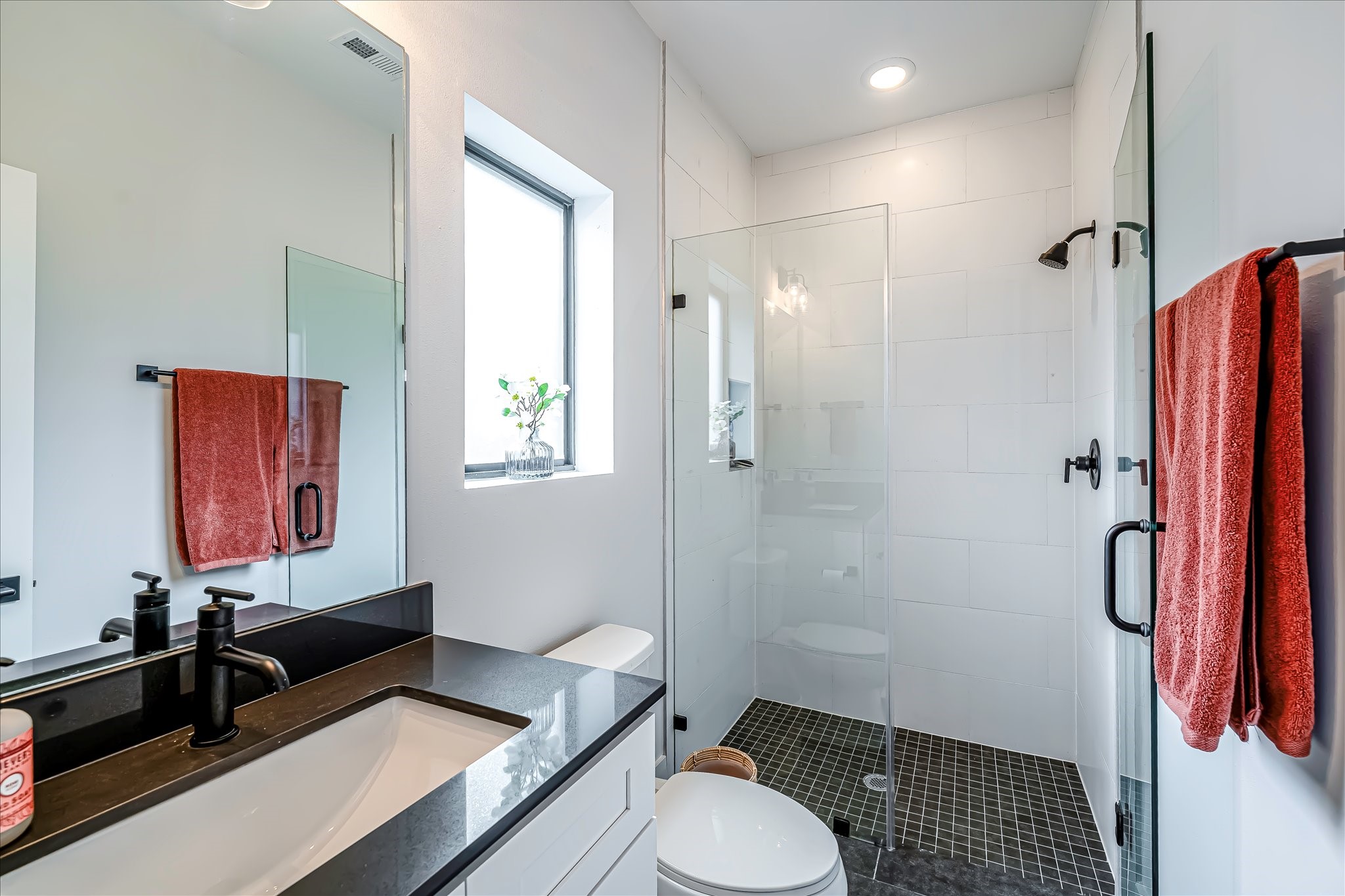 Well-appointed secondary bathroom designed with modern finishes and timeless style