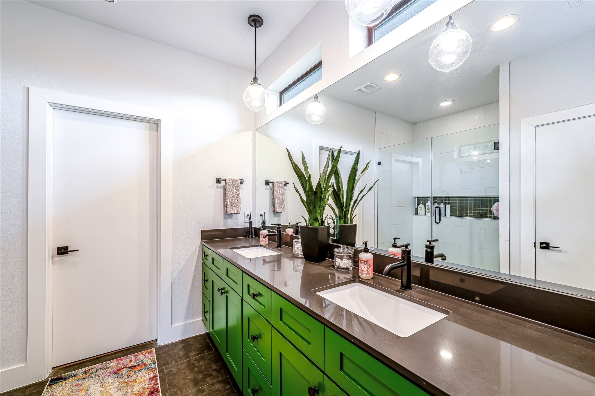 Spa-inspired primary bath with quality finishes, generous vanity space, and abundant natural light