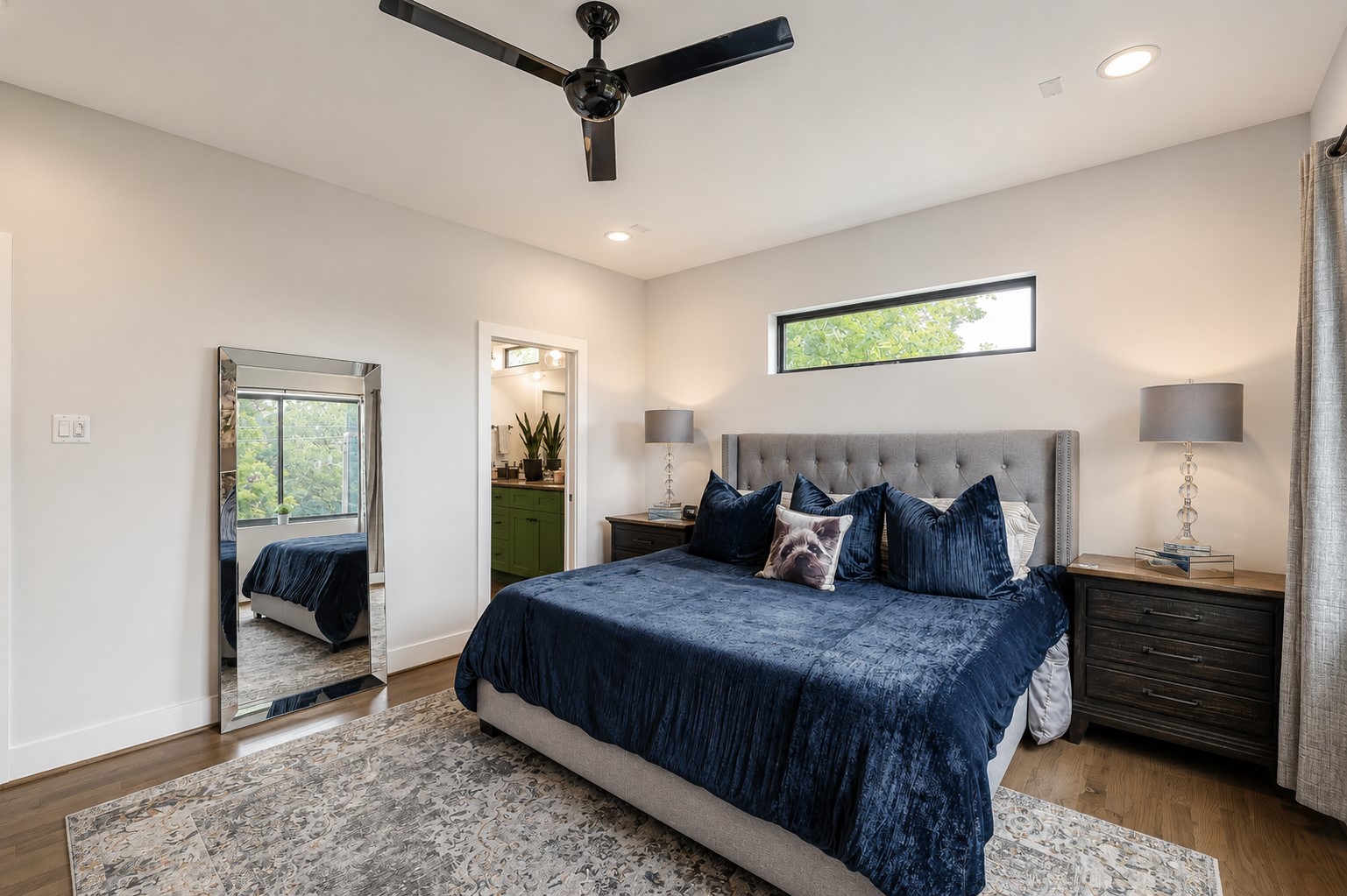 Luxury owner's suite offering plenty of room for large furniture while maintaining an open, relaxing atmosphere.Photos reflect previous furnishings. Home is currently vacant. Furnishings shown are for illustrative purposes only.