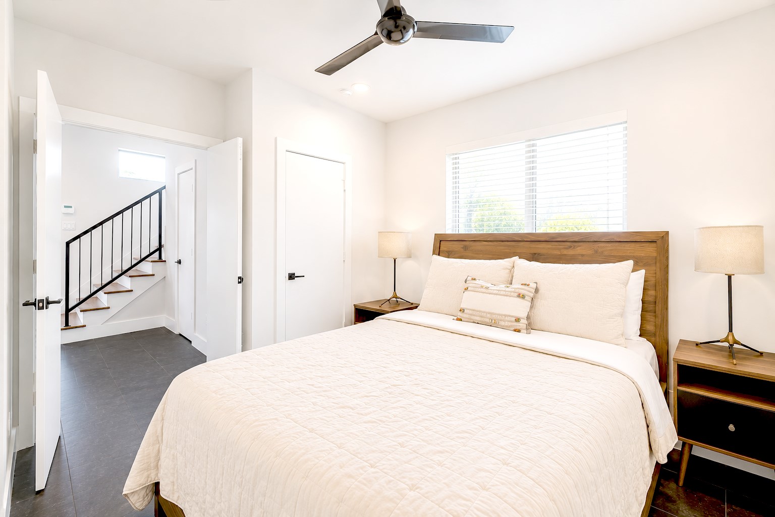 Versatile bedroom ideal as a guest suite, nursery, or home office.Photos reflect previous furnishings. Home is currently vacant. Furnishings shown are for illustrative purposes only.