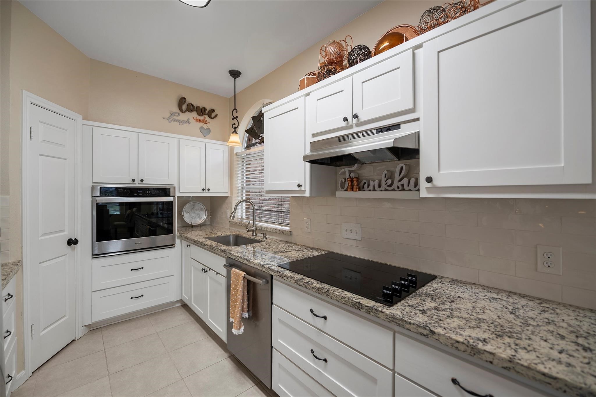 Kitchen with Granite & Stainless Appliances