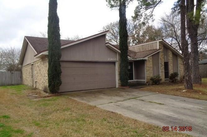 Single-story home classic brick exterior.