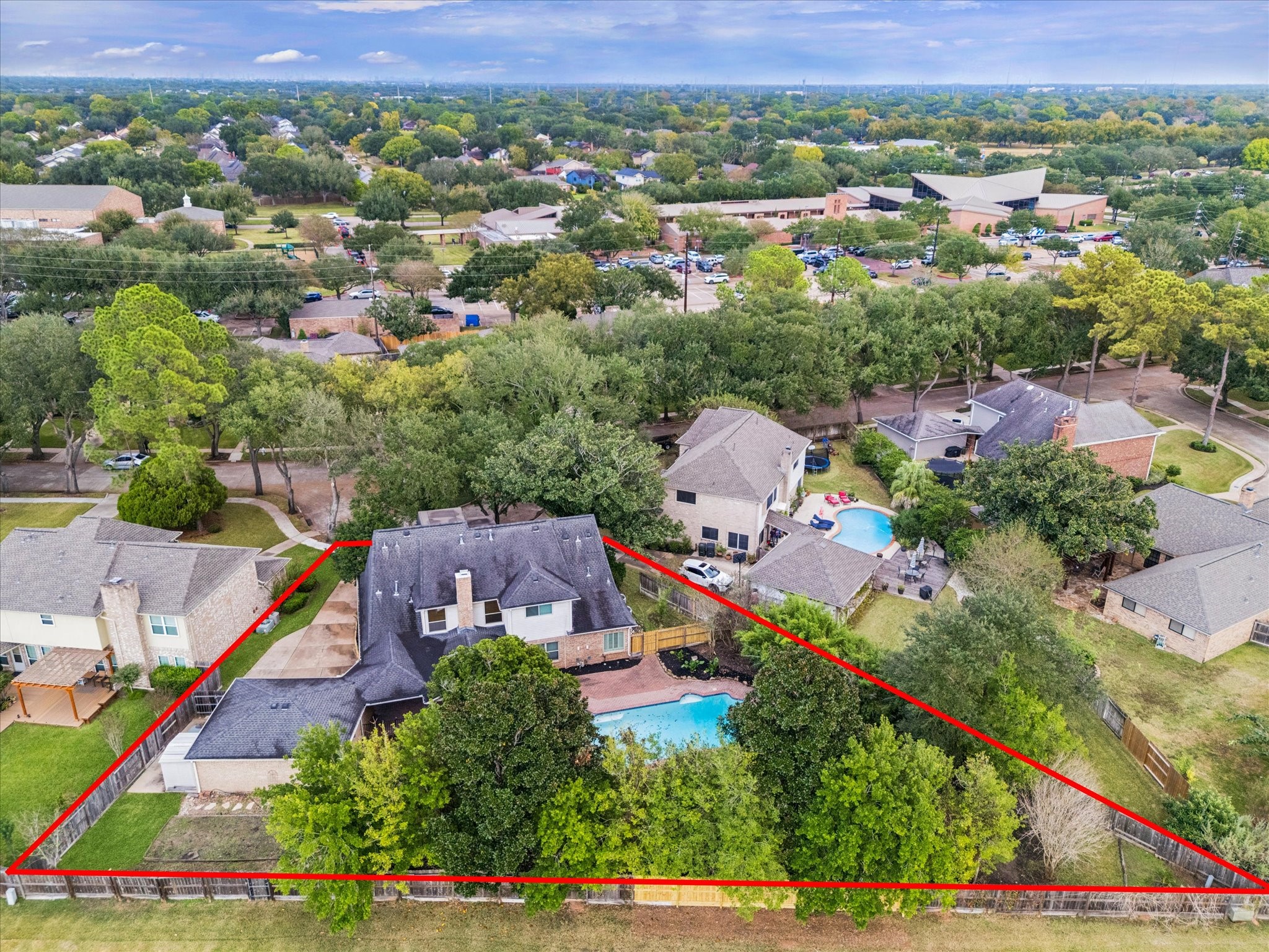 Set within a friendly, established neighborhood, this appealing residence boasts a beautifully maintained backyard, offering a private oasis with a sparkling in-ground pool perfect for relaxation and social gatherings.