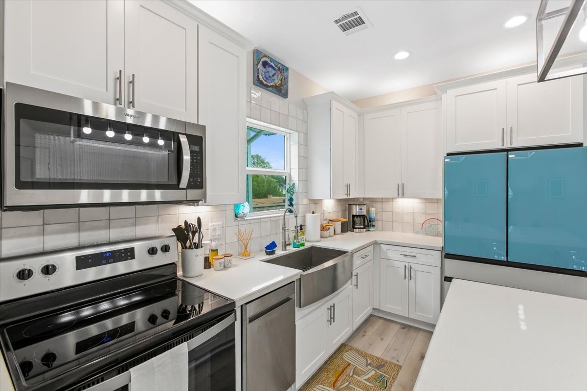 Quality appliance package with stainless deep basin sink.