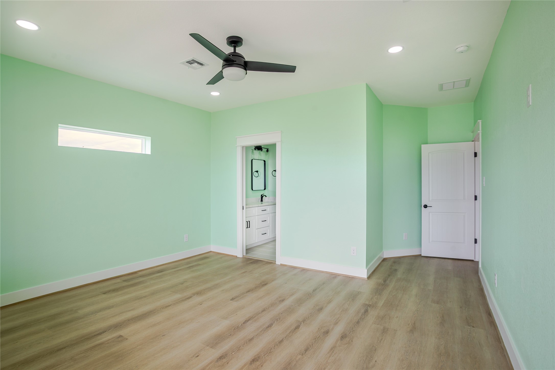 Large master bedroom with private bath. Side window for privacy and natural light galore!