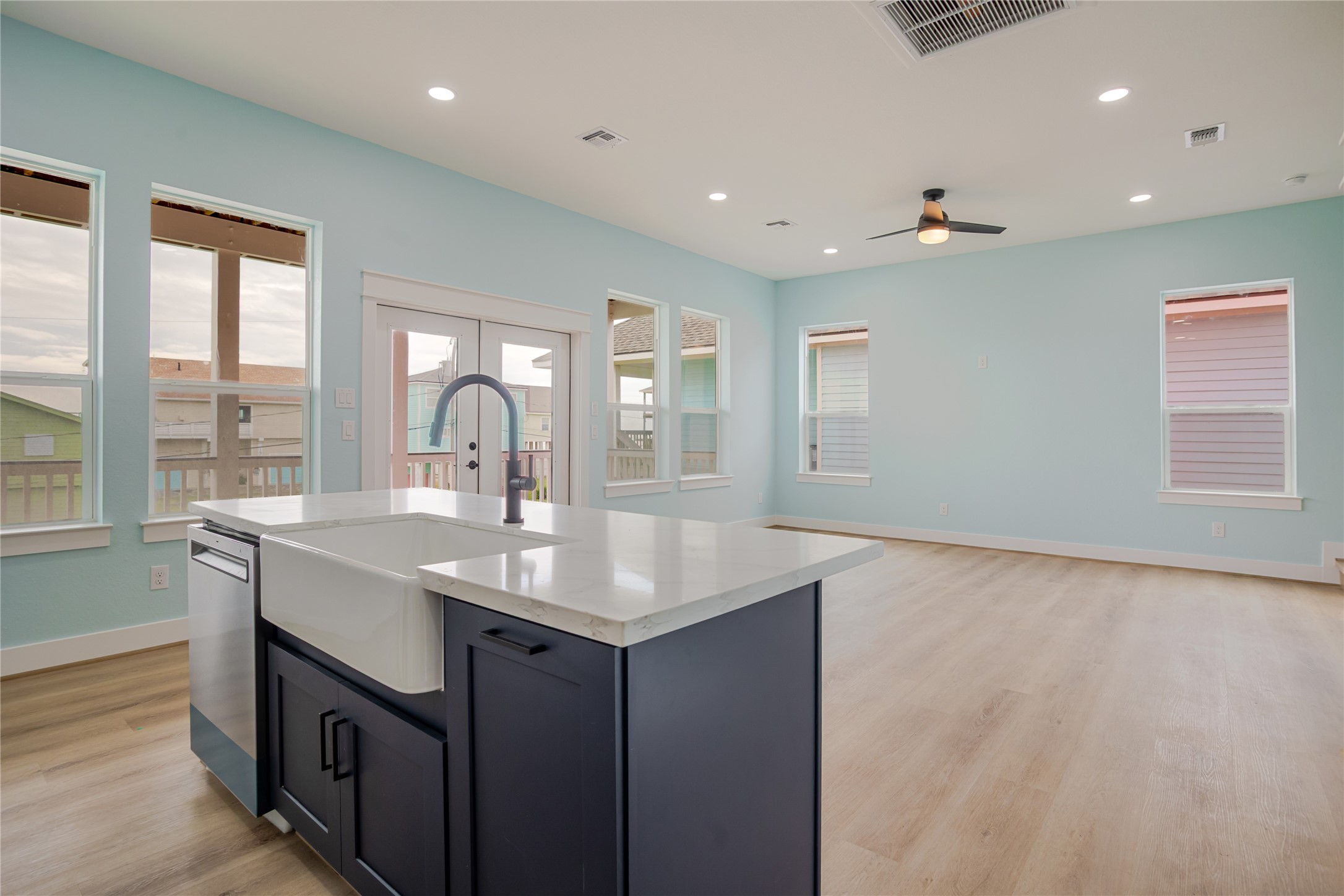 Farmers oversized sink and modern stain less faucet. Navy color accent for your new modern beach house!