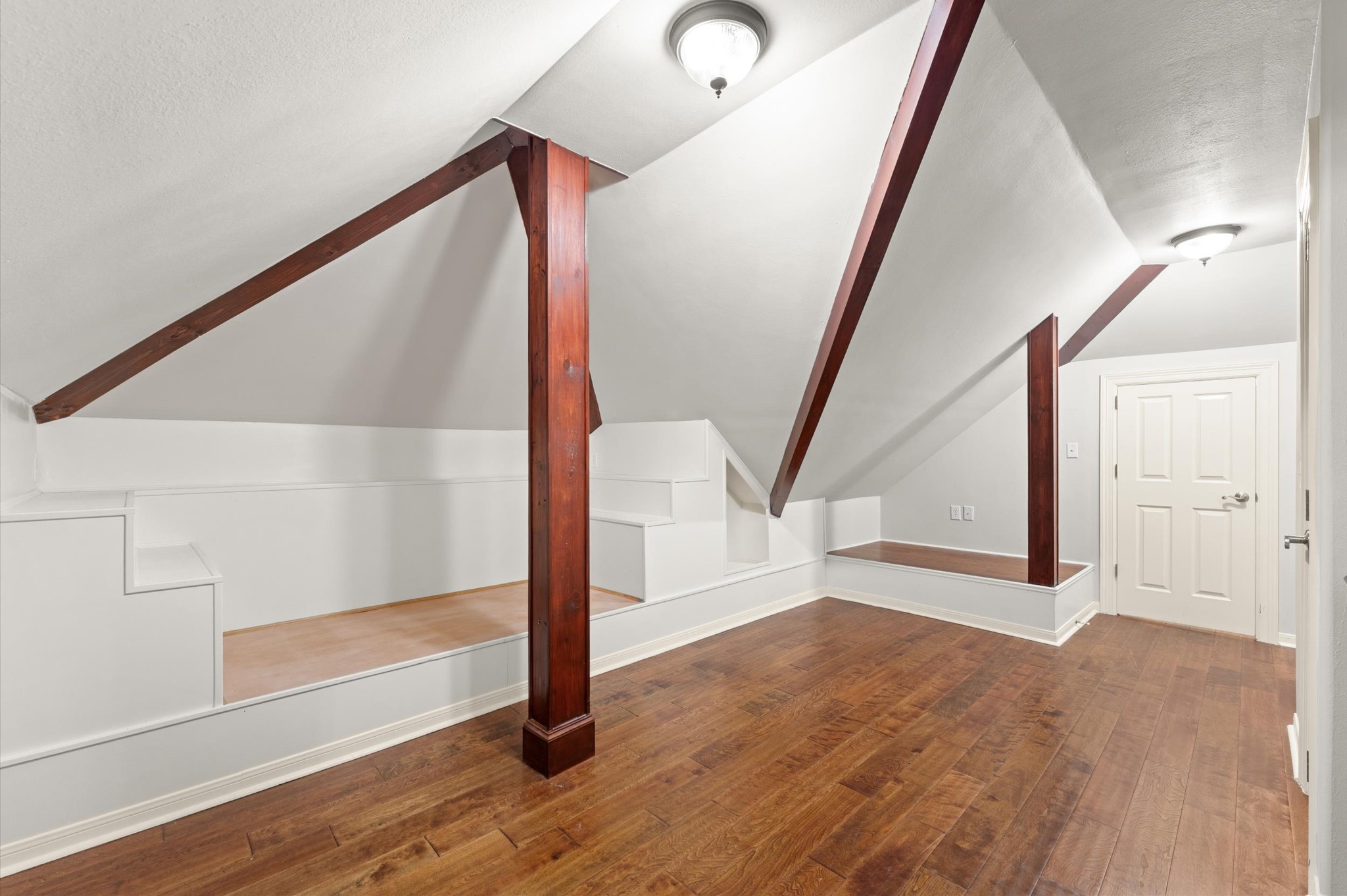 Going through the bathroom in the previous picture is another room with several closets for storage and a spiral staircase down to the garage.