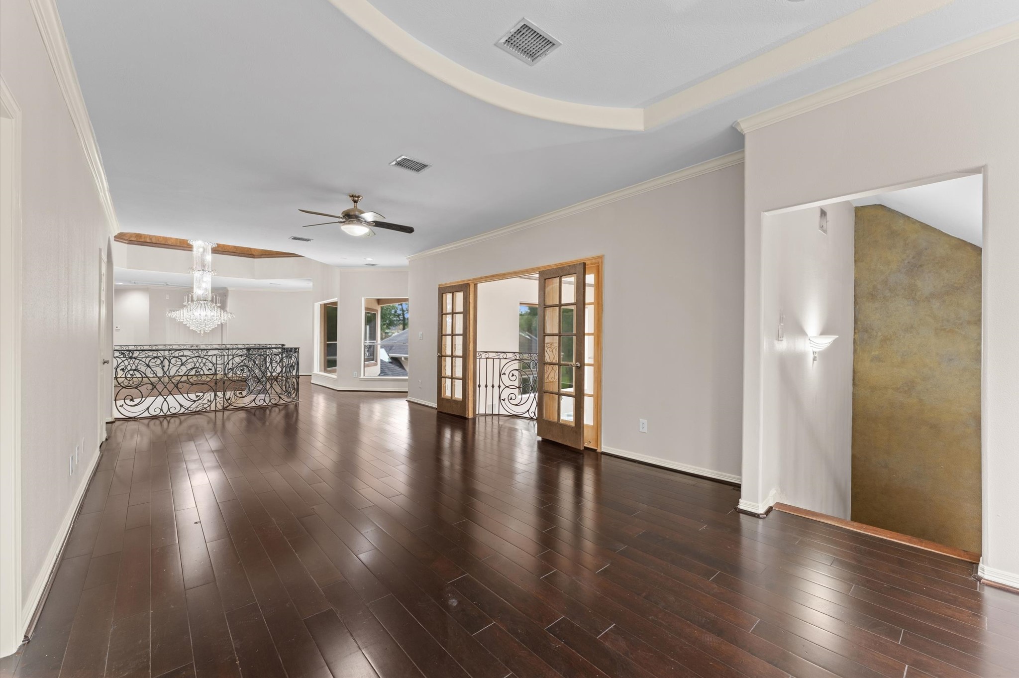 Another view of the grand room.  The doorway on the right is a second stairway which leads down to the kitchen.