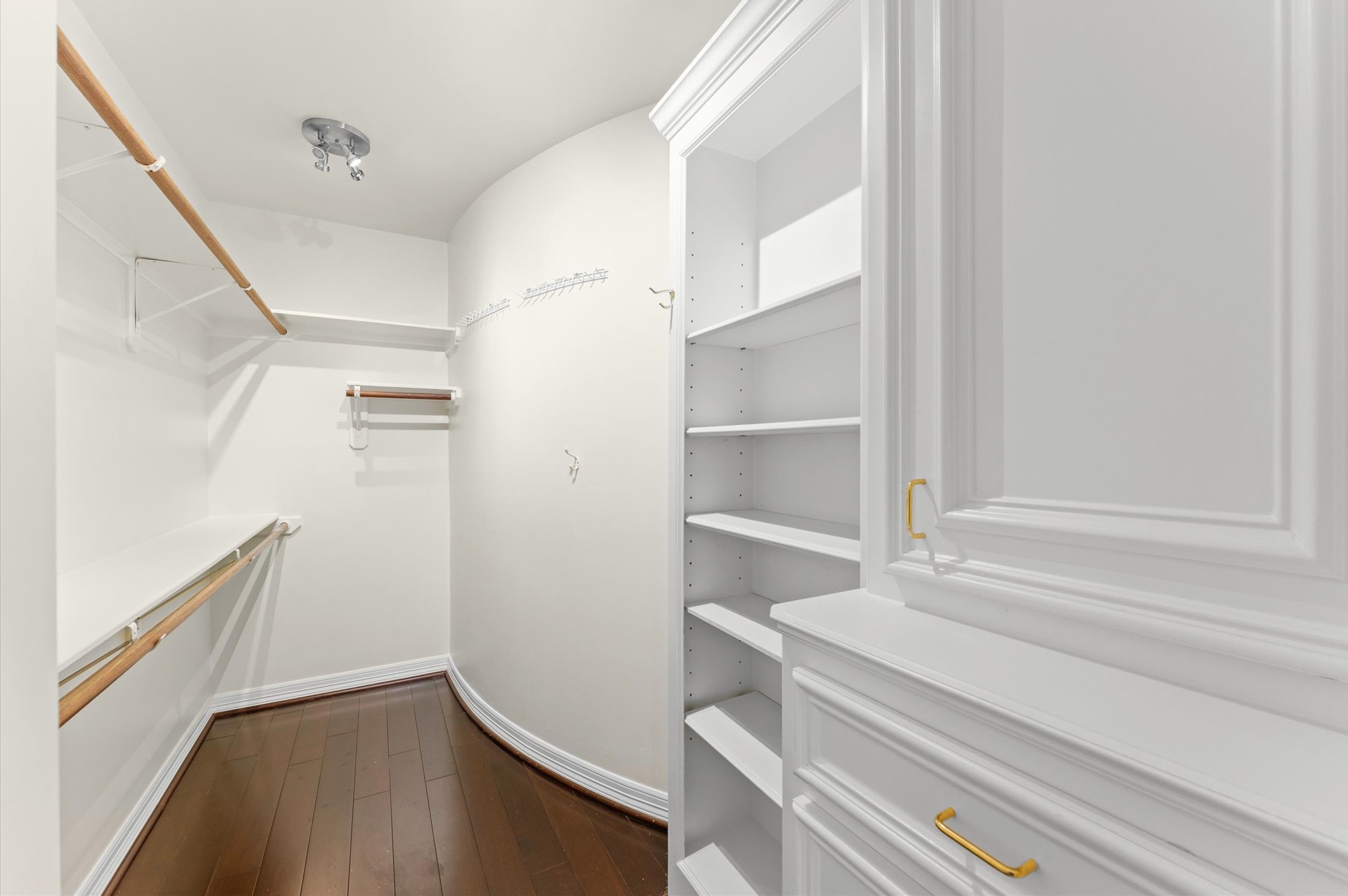 A peak into Closet No. 2 in the primary bedroom.