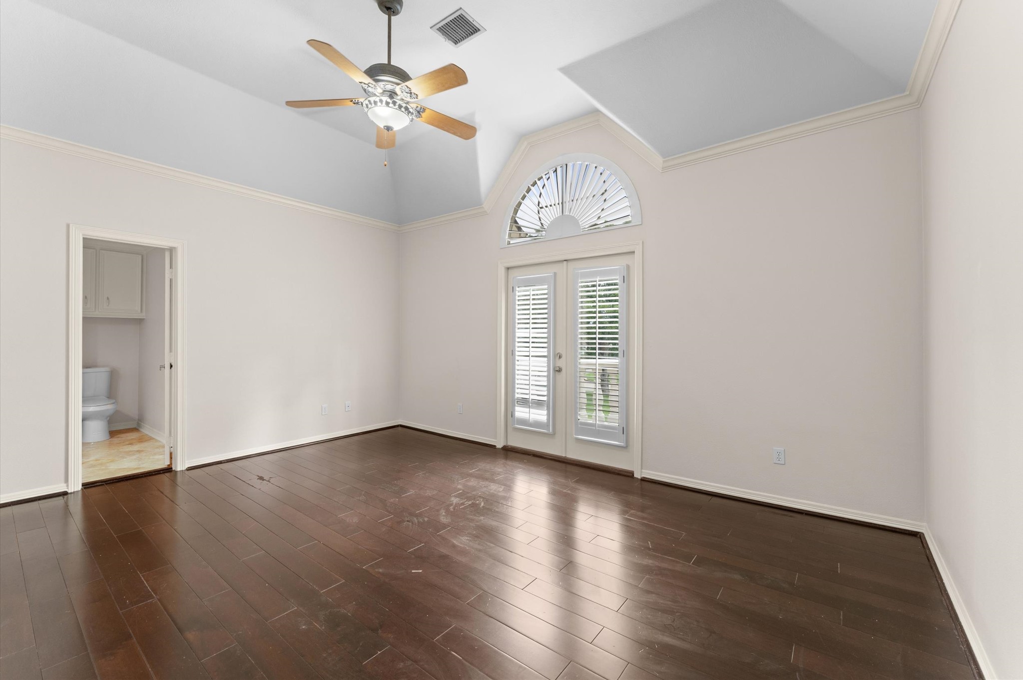 This bedroom is special as it has a balcony and which overlooks the backyard.