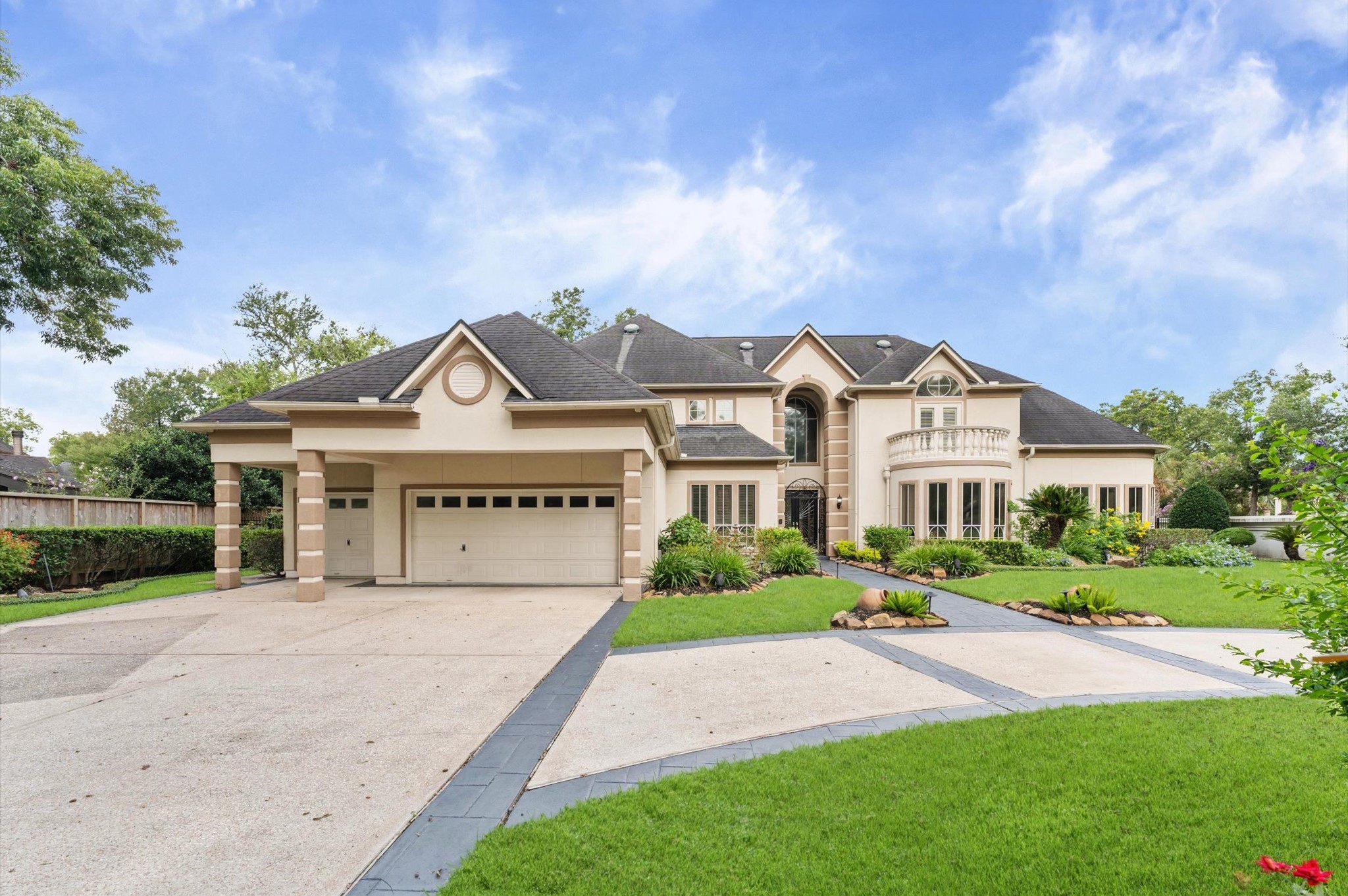 This home has a 3-car garage, porta-cache and sits on just under an acre.