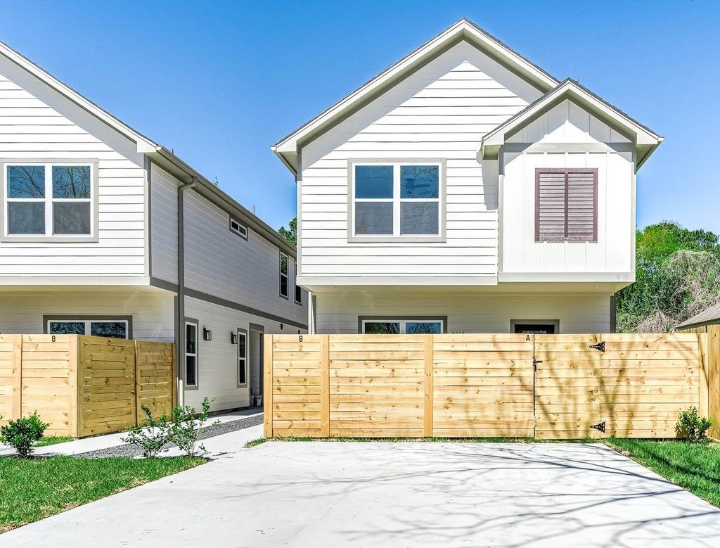 Spacious driveway, private yard.