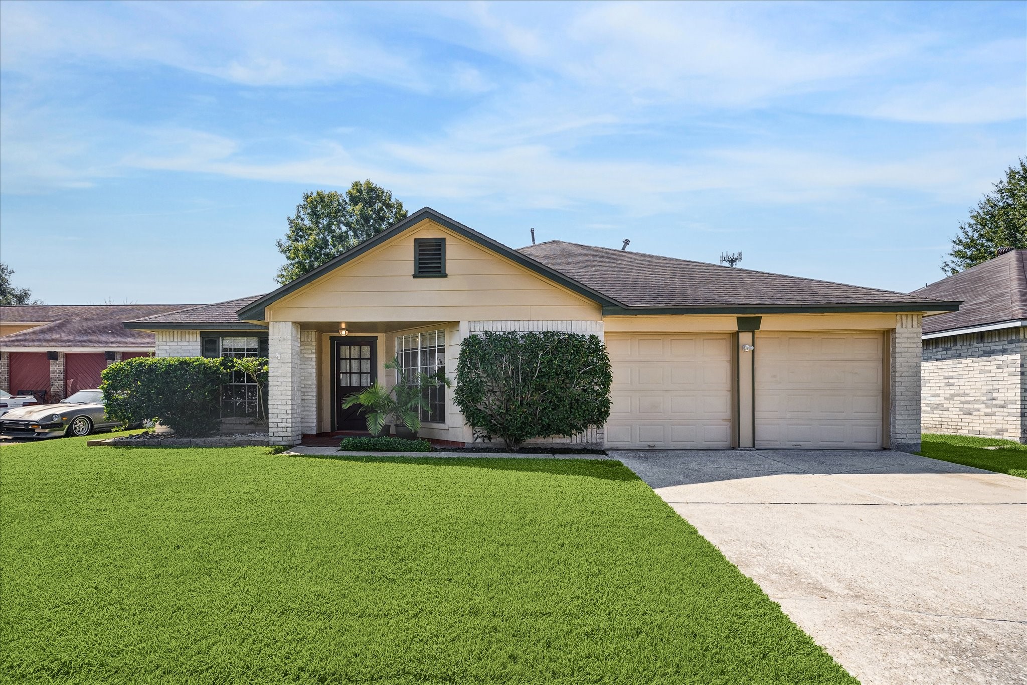 Well-maintained single-story home, set on a spacious 6,300 SF lot with a broad front lawn, mature landscaping, and an attached two-car garage. A 2020 roof adds another notable update to the home.