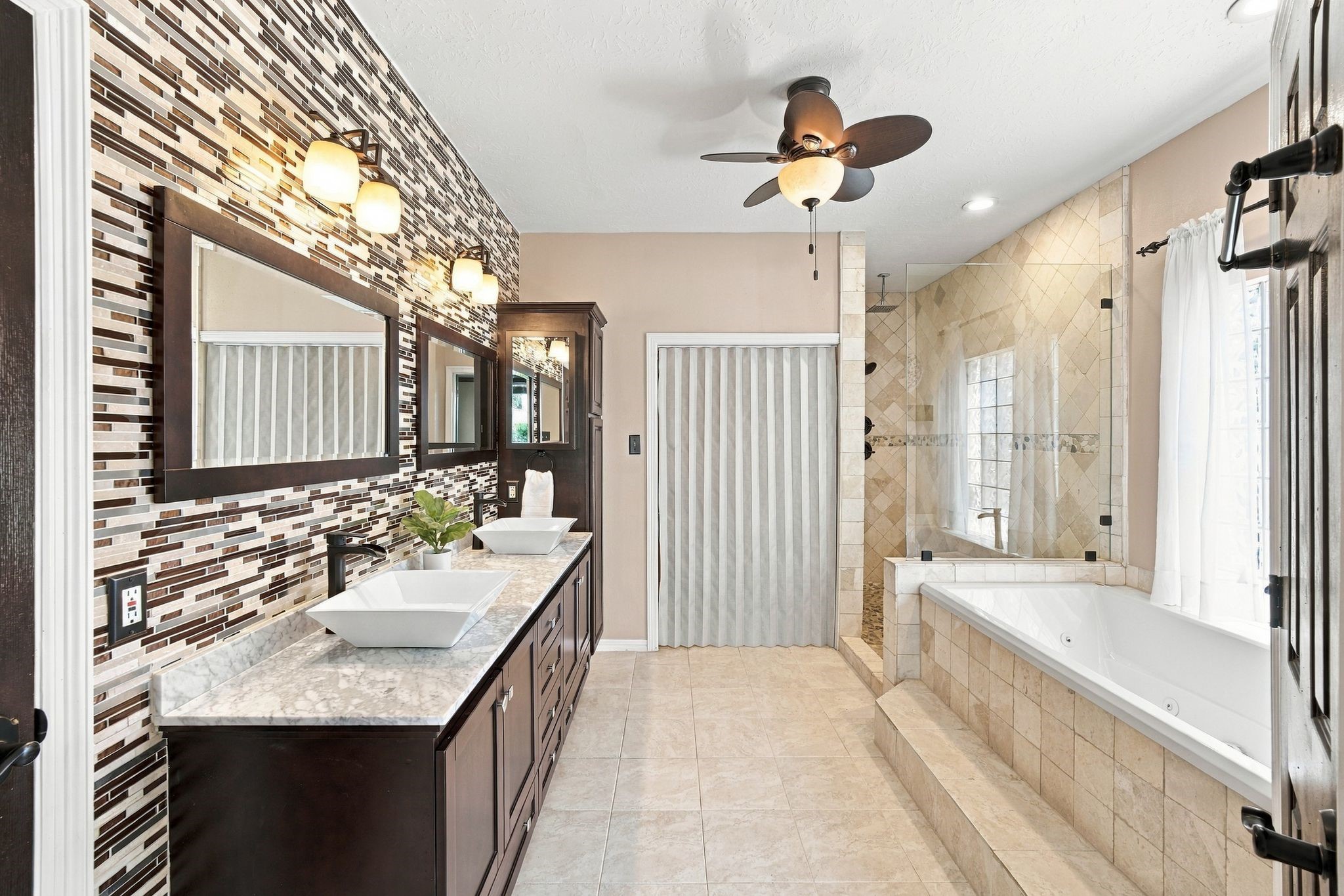 Experience luxury with a spacious walk-in closet and elegant separate shower, perfect for your serene retreat.
