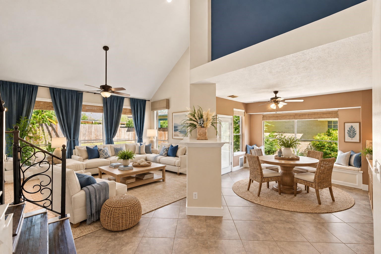 The foyer leads to an inviting living room and breakfast area, seamlessly connected by a dual-sided fireplace.