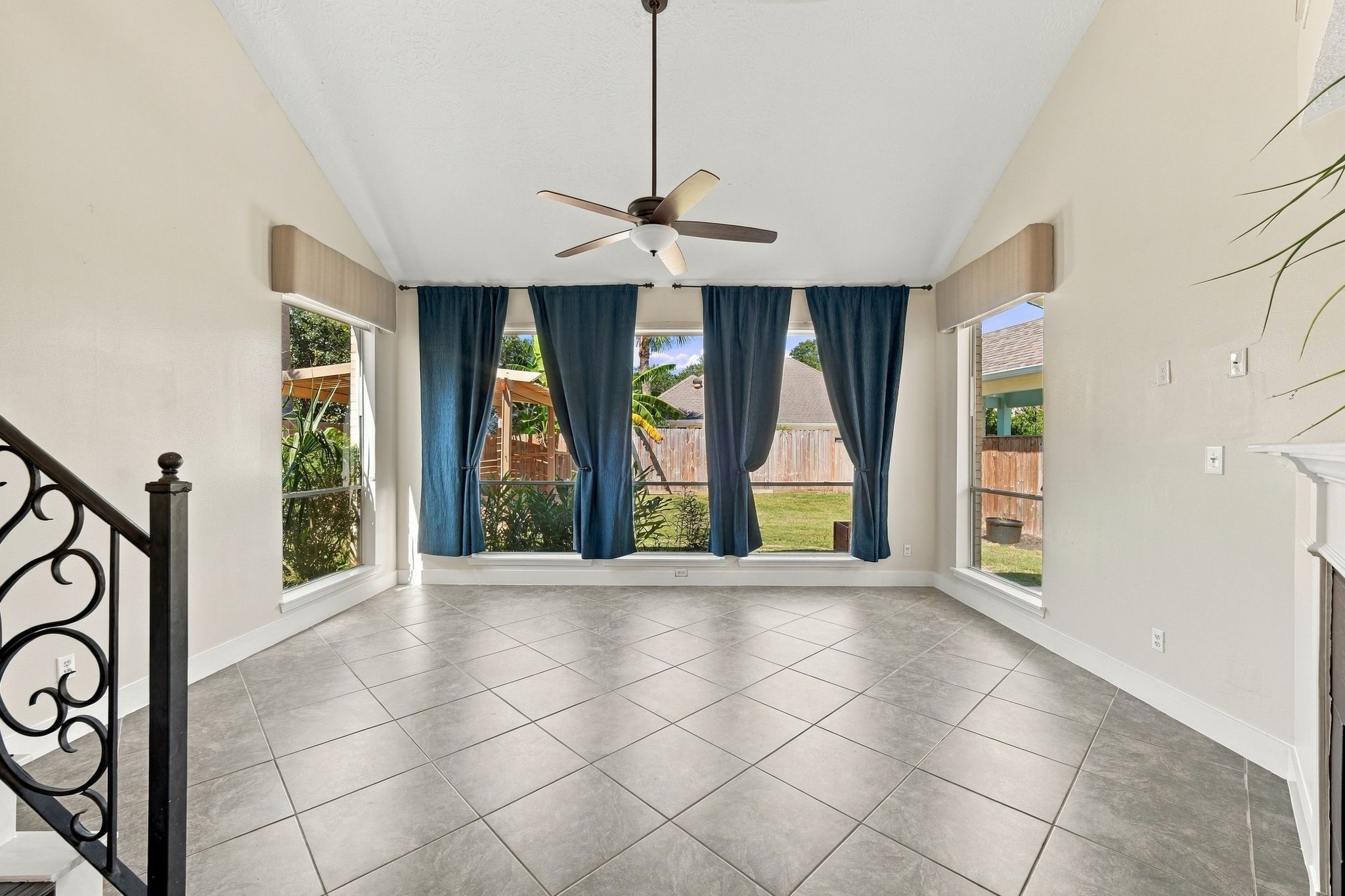 Bright and inviting, this open space features large windows that flood the room with natural light, offering a blank canvas ready for your personal touch.
