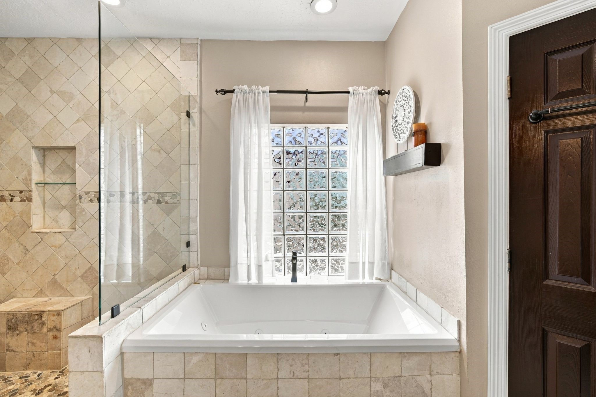 Indulge in ultimate relaxation with the luxurious oversized jetted tub, perfect for unwinding in style.