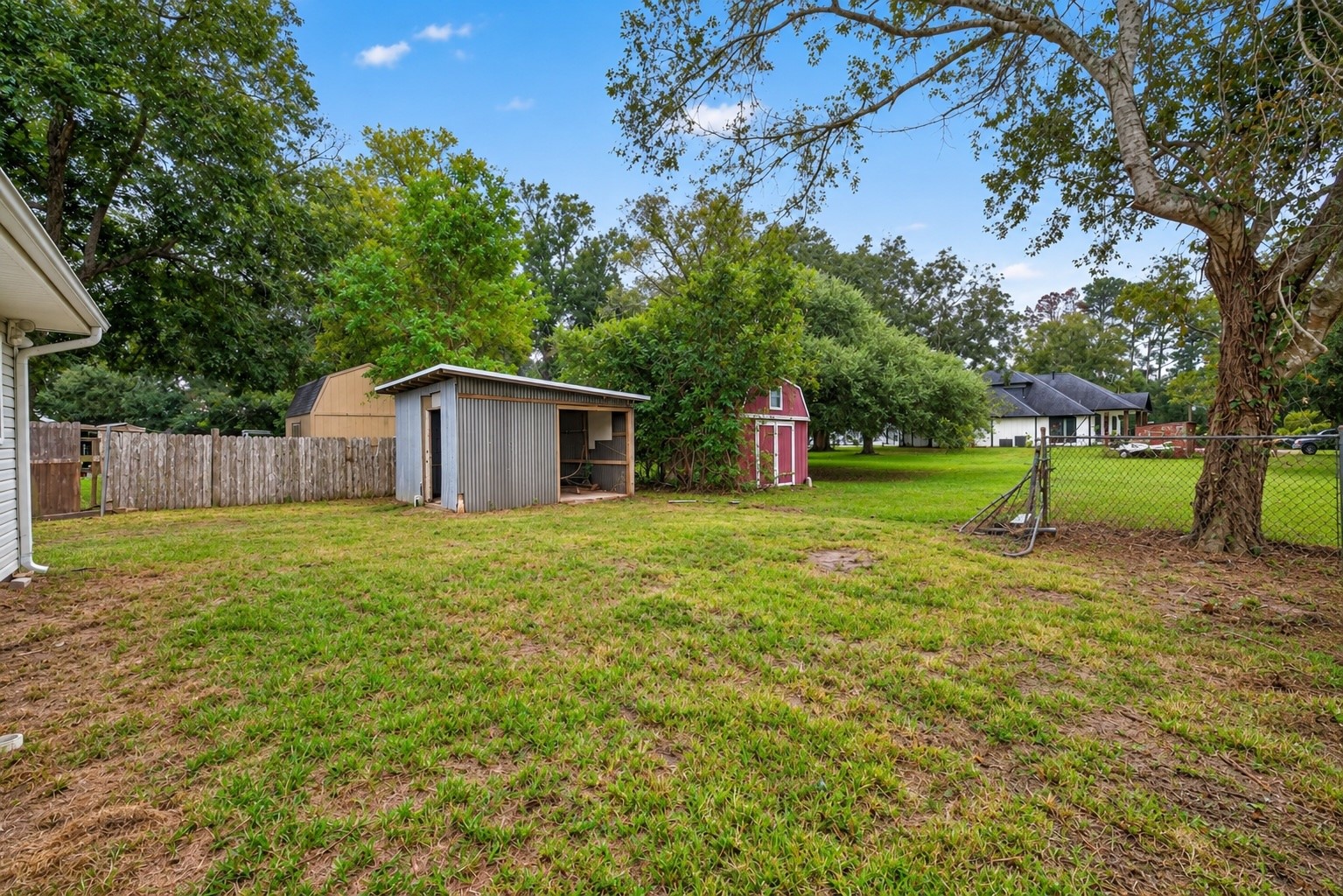 Side Yard view with metal building