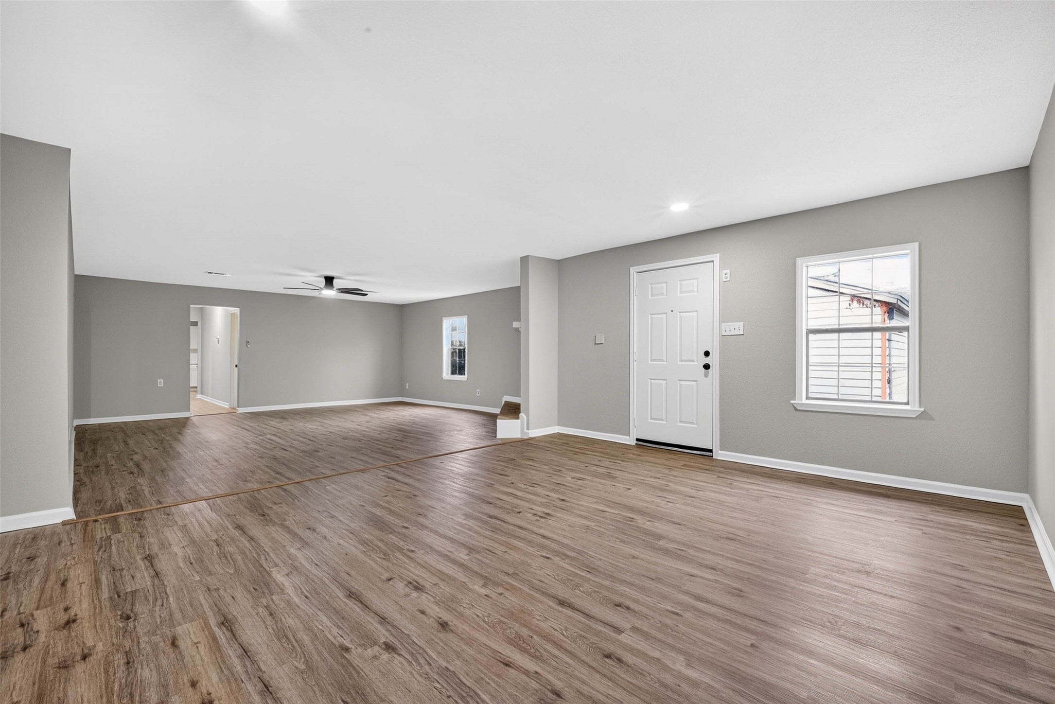 View of Dining and Living rooms from the back bedroom