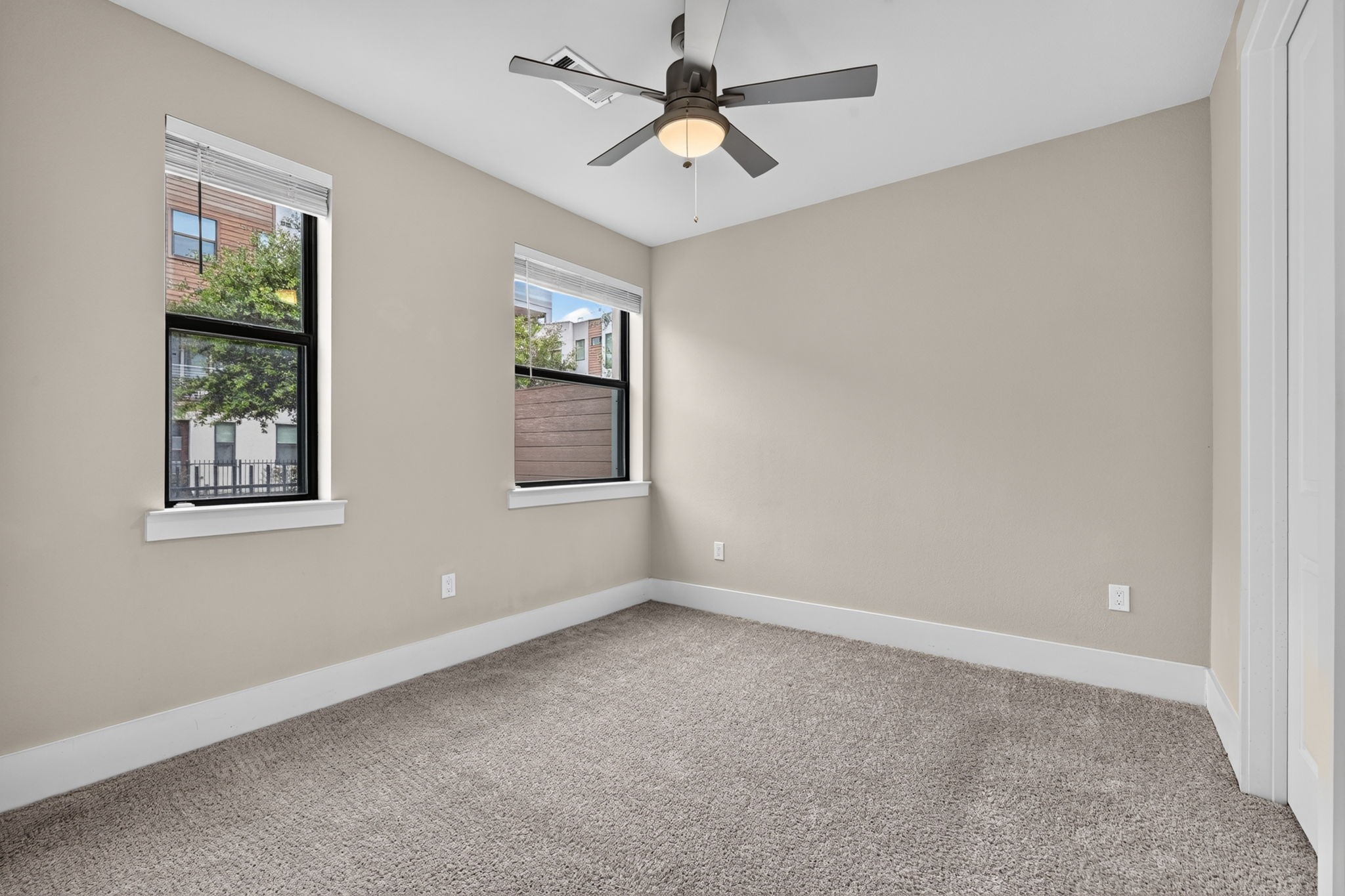This is the secondary bedroom on the 1st floor. It features its own en-suite bath and walk-in closet.