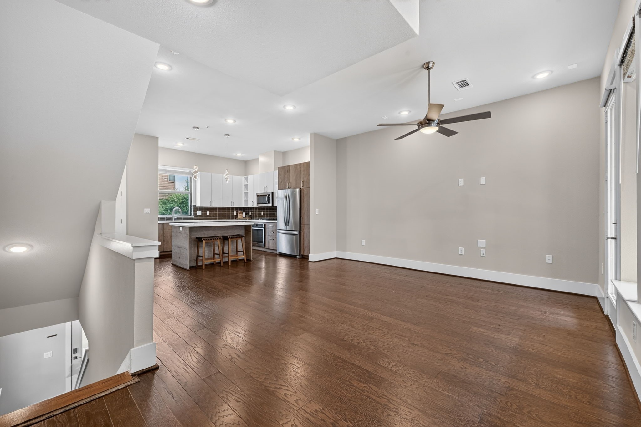 A view of the kitchen/living from the top of the stairs