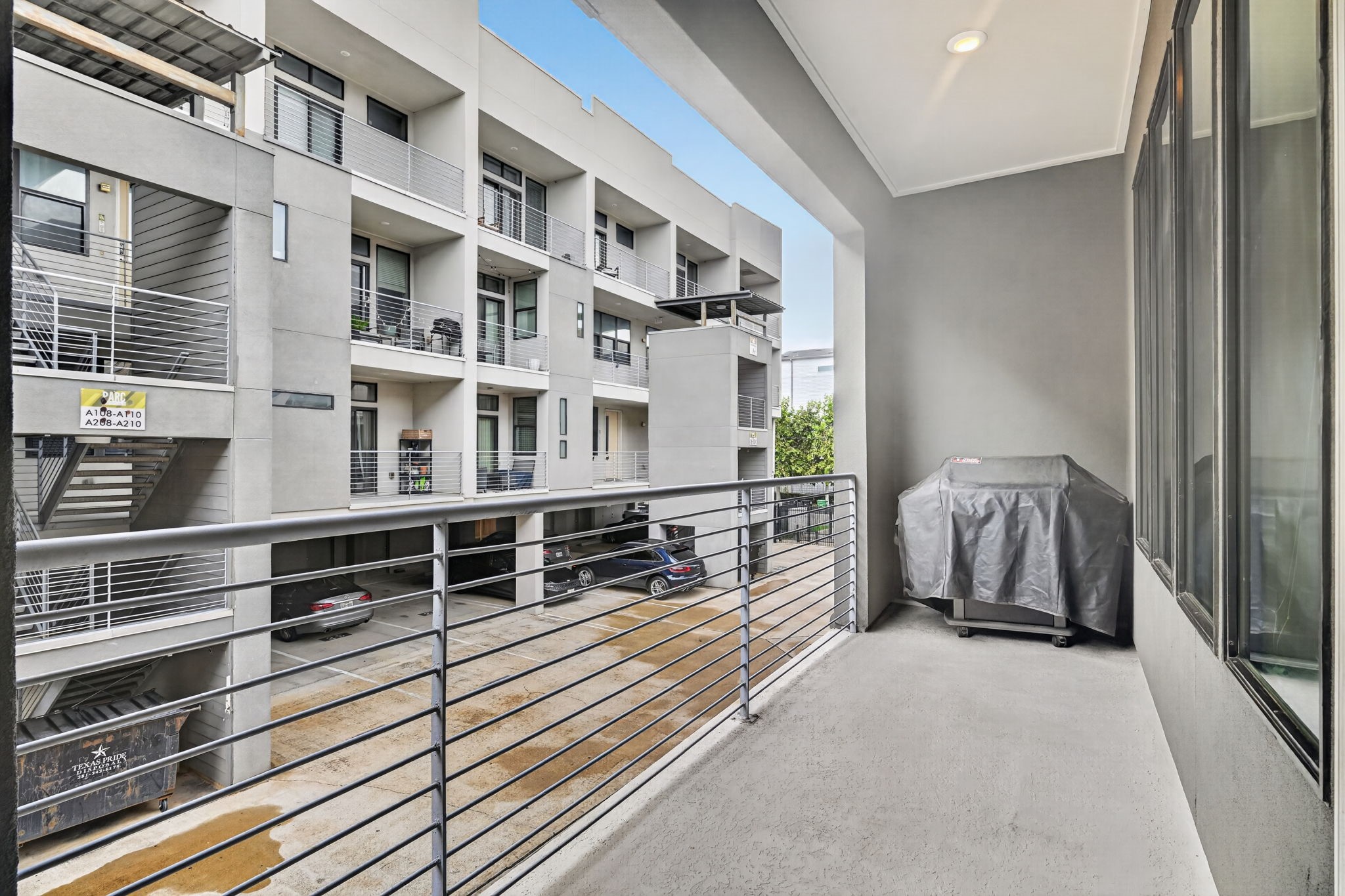 The large 2nd story patio has plenty of room for furniture, plus it comes with a BBQ pit!