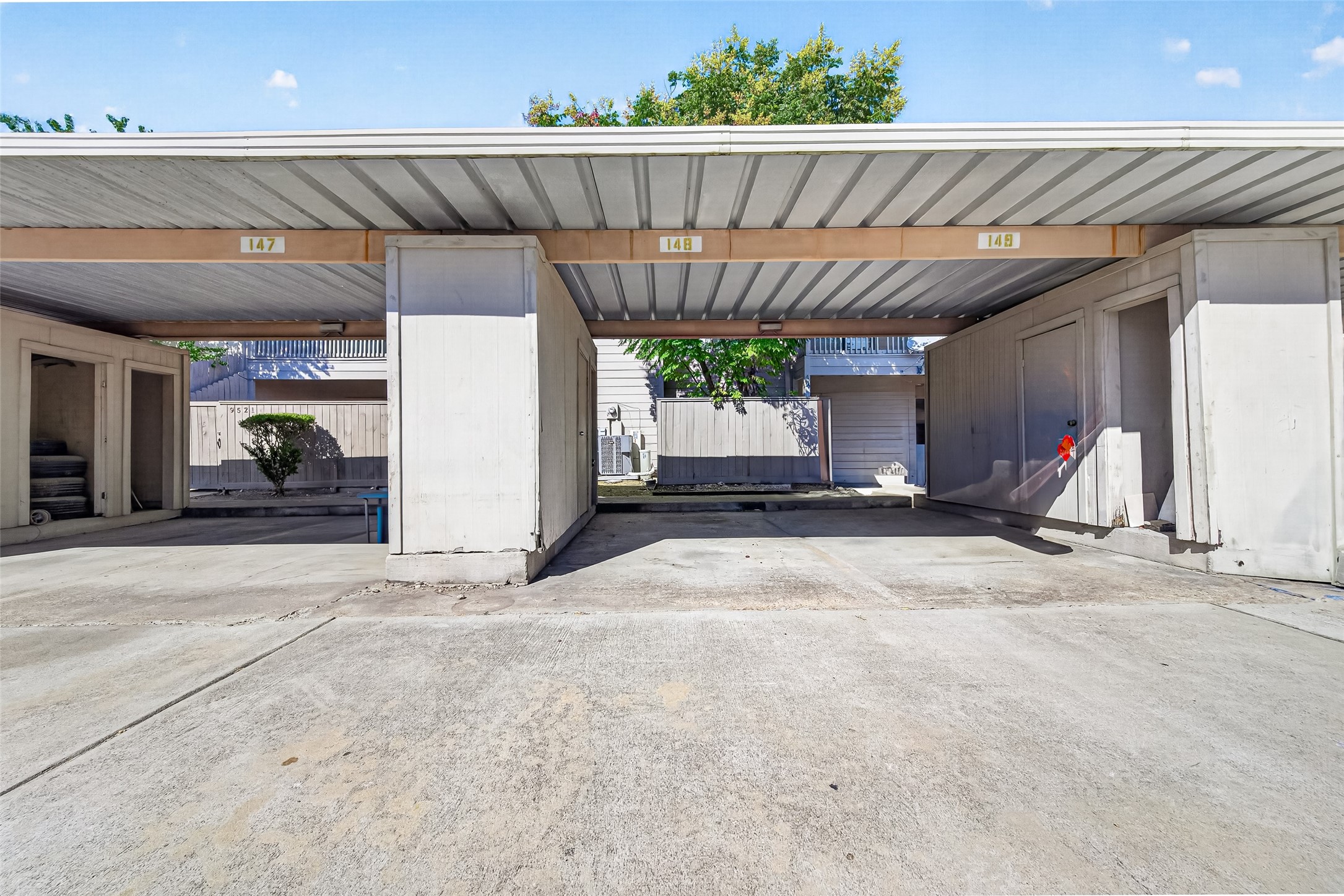 Spacious one covered parking area with individual storage unit,offering convenience.