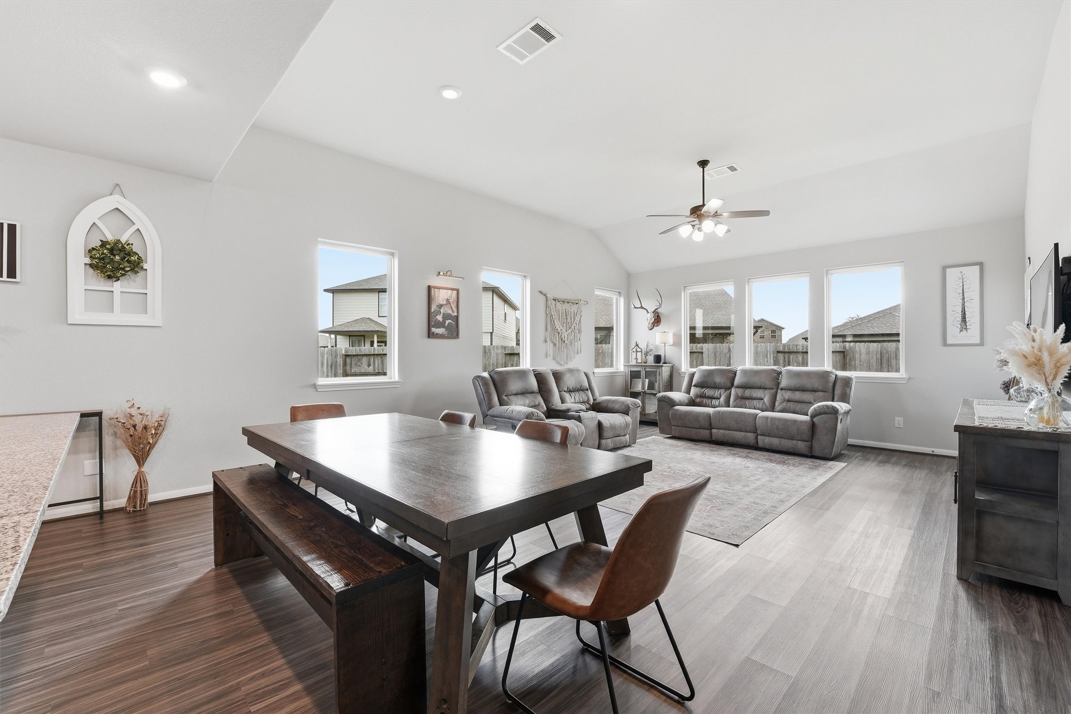 Spacious open-concept dining and living area. Perfect for family gatherings and entertaining. Spacious open-concept dining and living area. Perfect for family gatherings and entertaining.