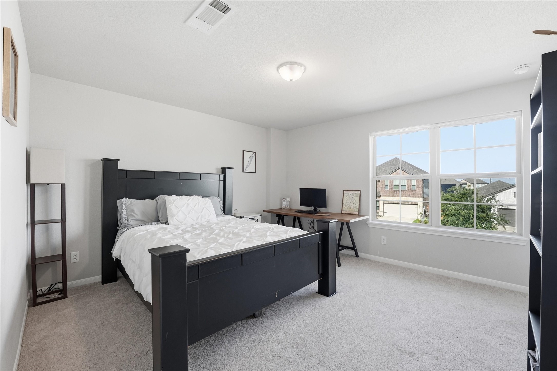 This spacious secondary bedroom features a large closet.
