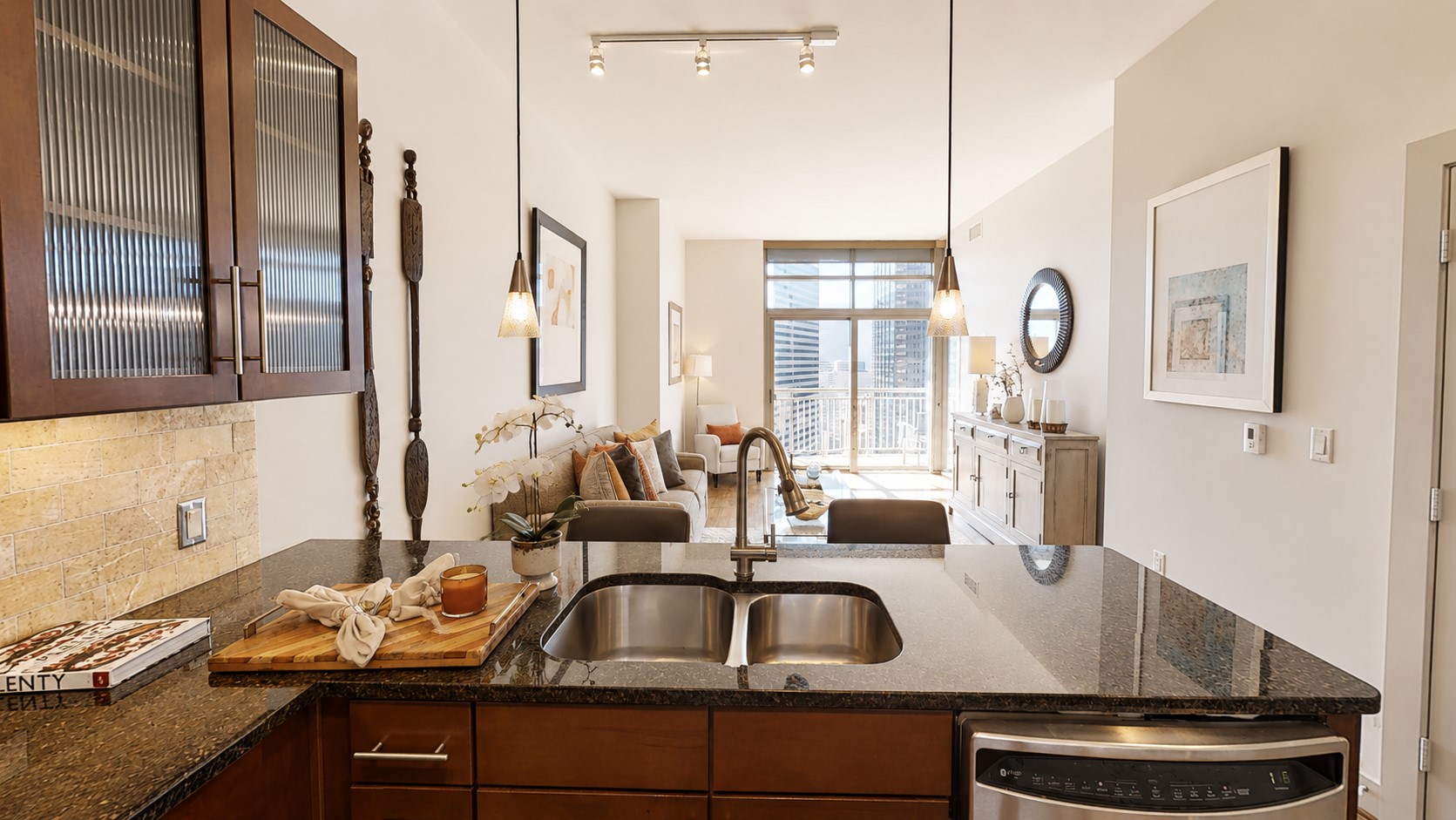 The kitchen really feels like part of the home here, not tucked away from it. The open layout keeps you connected to the living area whether youre cooking, entertaining or simply enjoying a quiet night in.