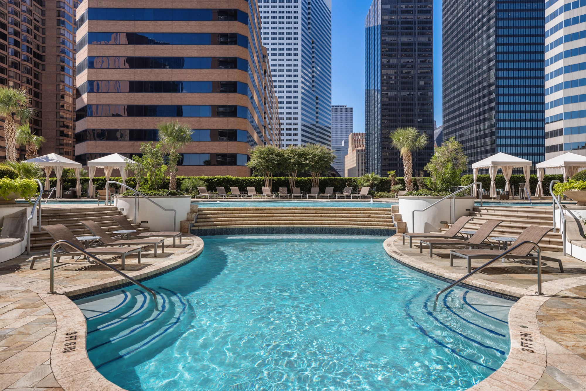 Inspired by the ambiance of a world-class resort, the expansive pool features multiple lounging areas, cascading water features, and private cabanas that create the perfect setting for relaxing under the Houston sun. Every detail is designed to deliver a true luxury lifestyle.