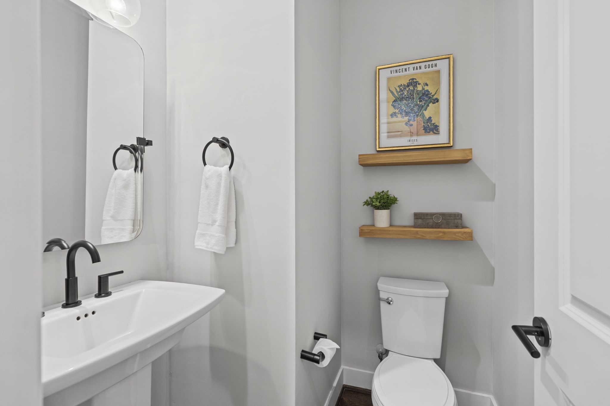 Beautiful powder room with access from the main living room.