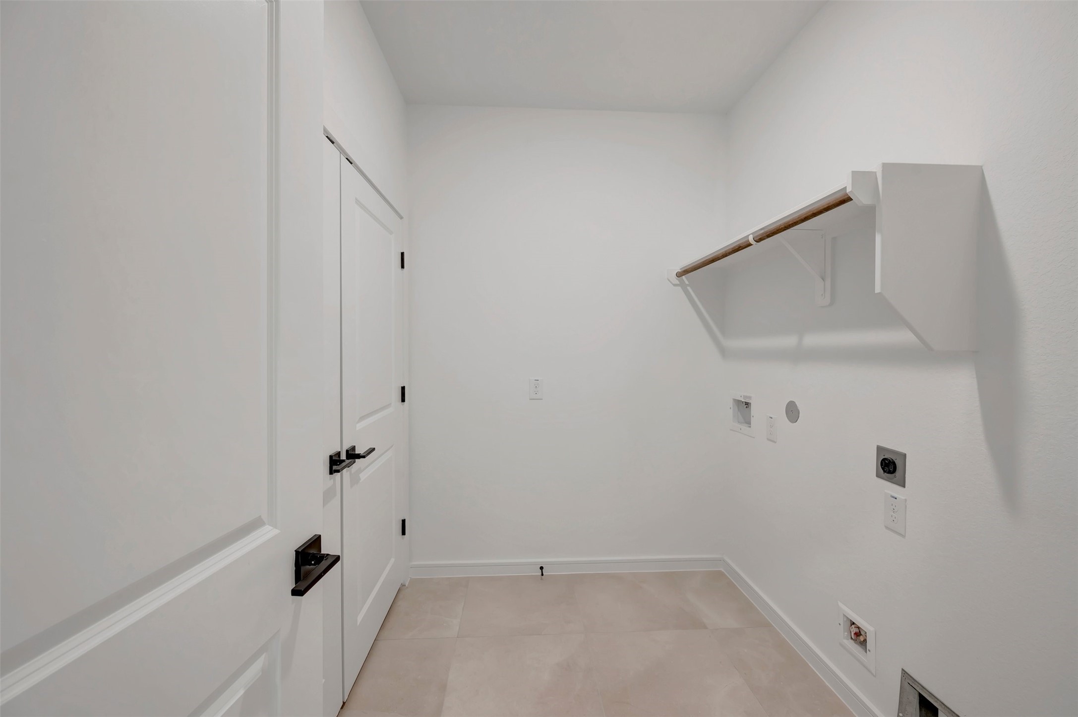 Laundry room (*Photo not of actual home and used for illustration purposes only.)