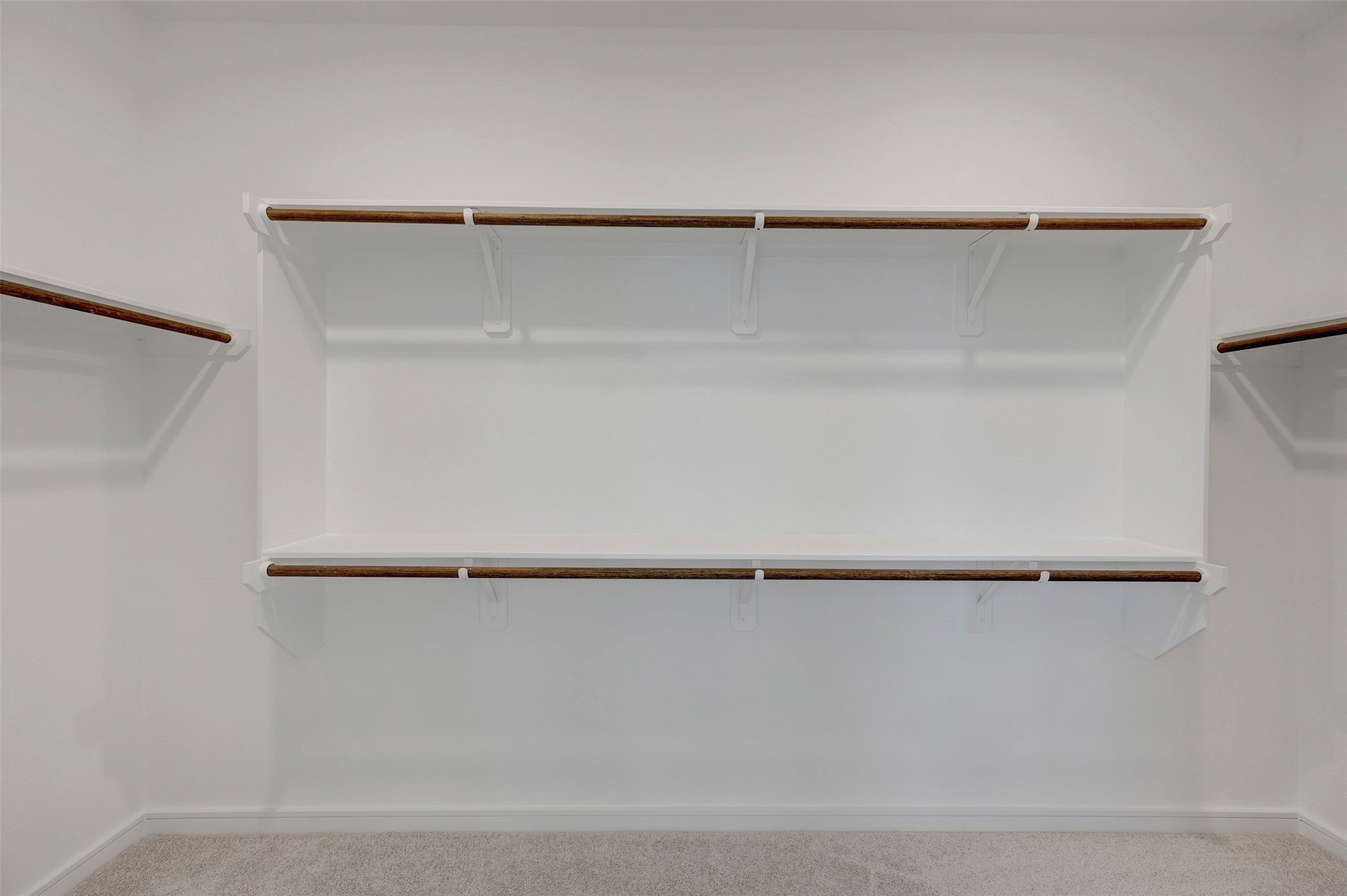 Primary walk-in closet (*Photo not of actual home and used for illustration purposes only.)