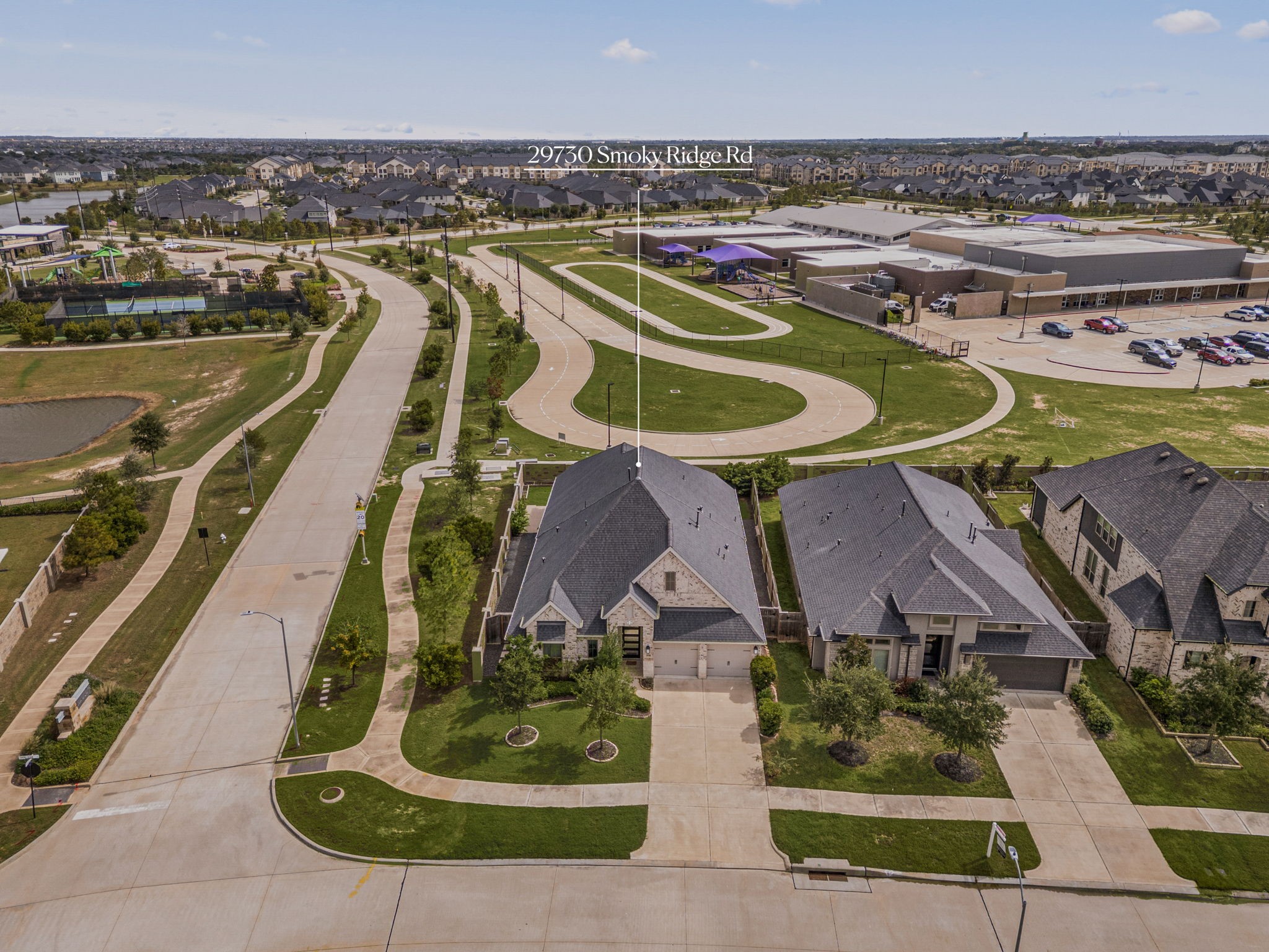 Welcome to Creek Cove at Cross Creek Ranch, a sought-after enclave within one of the area's premier master-planned communities. Pictured here is the proximity of the home to the the community playground and recreation center for ultimate convenience.