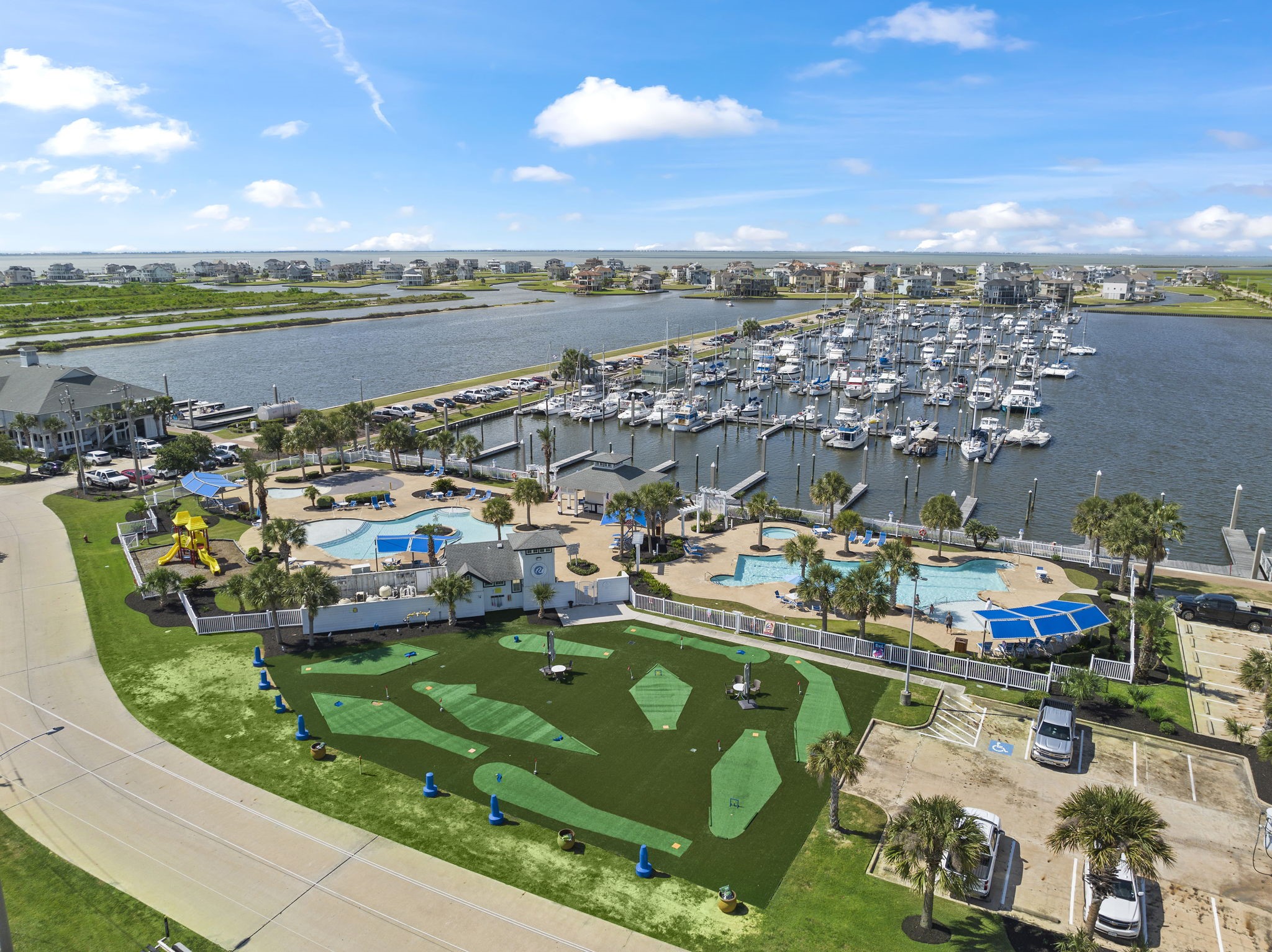 Harborwalk marina, swim center with Flamingo Bar, playground & miniature golf