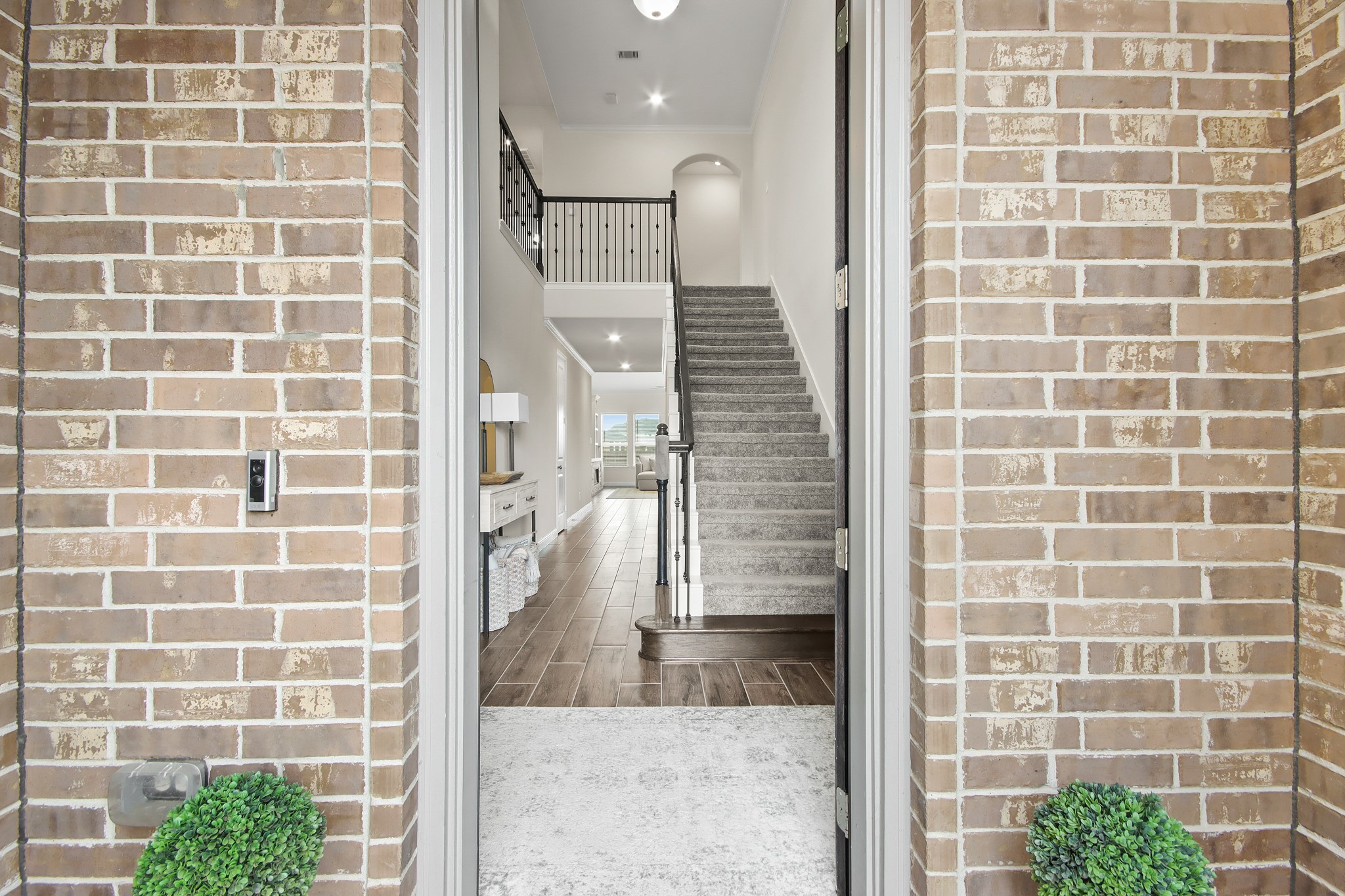 Inviting Woodcraft 8' Mahogany wrought iron front door with Charcoal stain