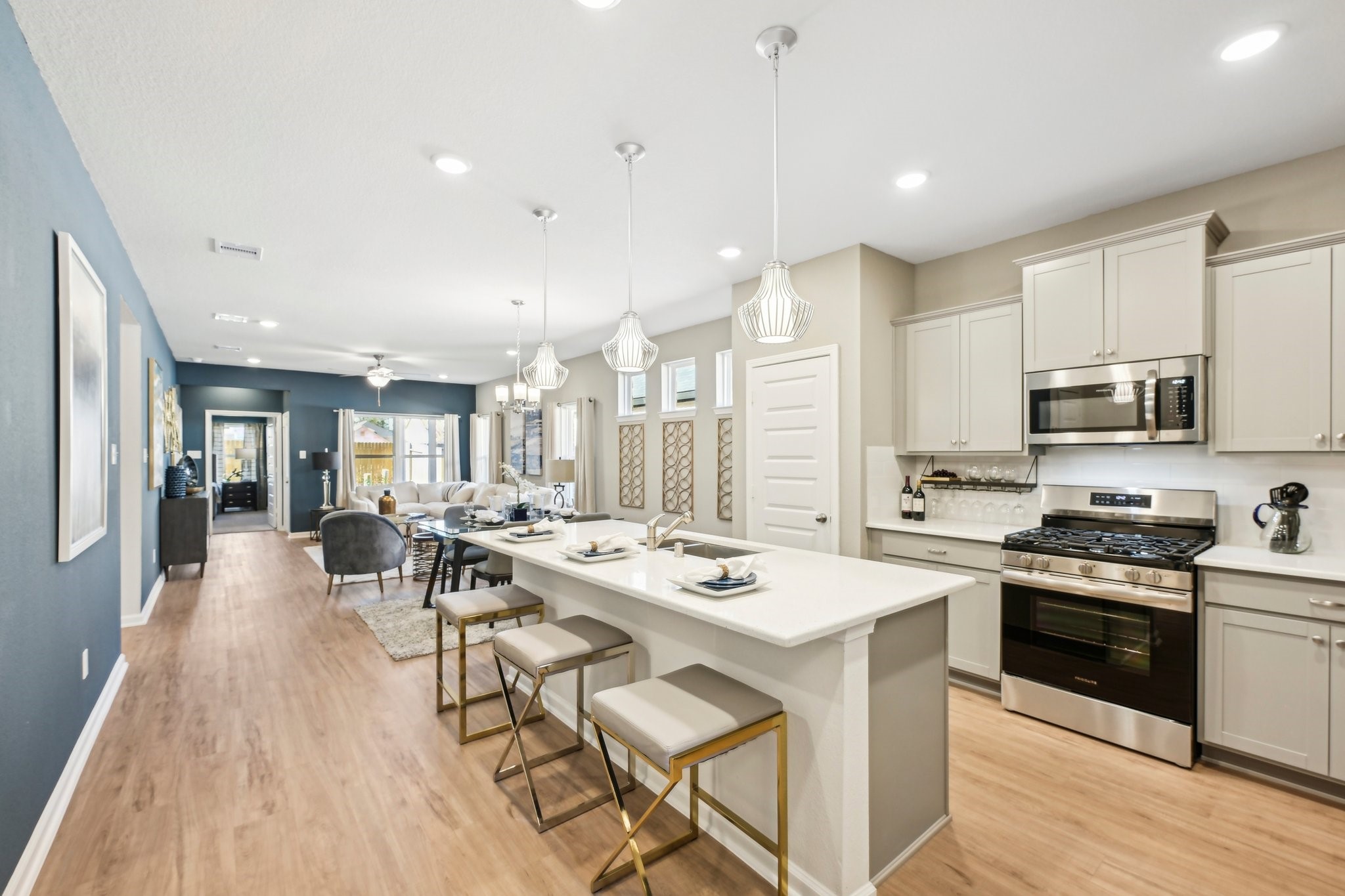 Oakshire II- Kitchen & Family. Sample image for illustration; upgrades, options, and colors may vary.