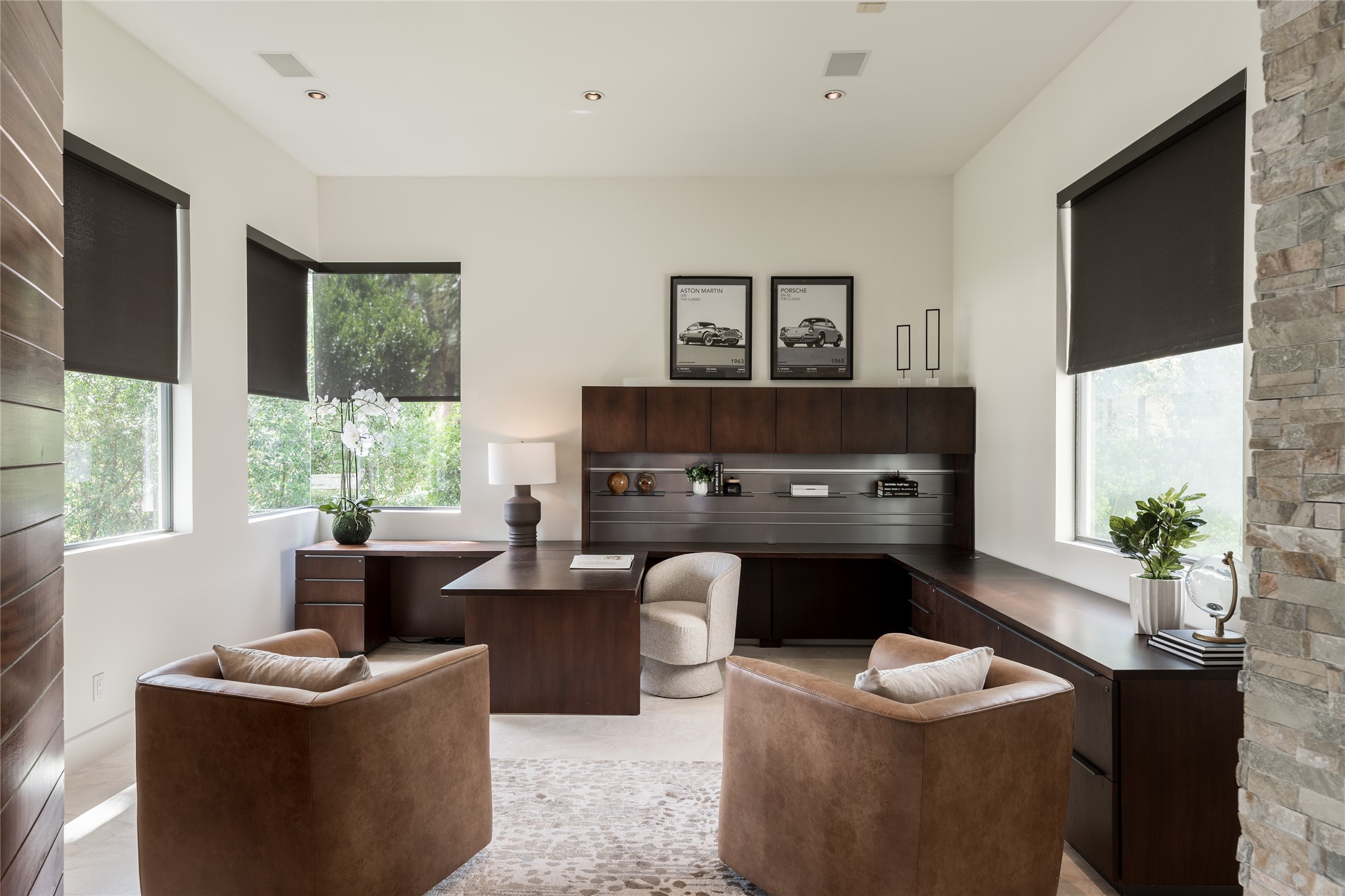 Positioned just off the foyer to the left of the entry, the private study creates a natural separation between work and the homes main living spaces. Its placement allows for an immediate transition from arrival to a dedicated office without disrupting the flow of the residence
