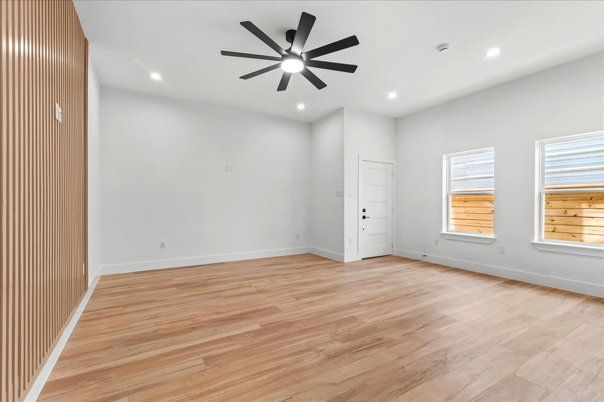 Unit B - Spacious living area. Accent Wall design may vary. Pictures are from a previous build.