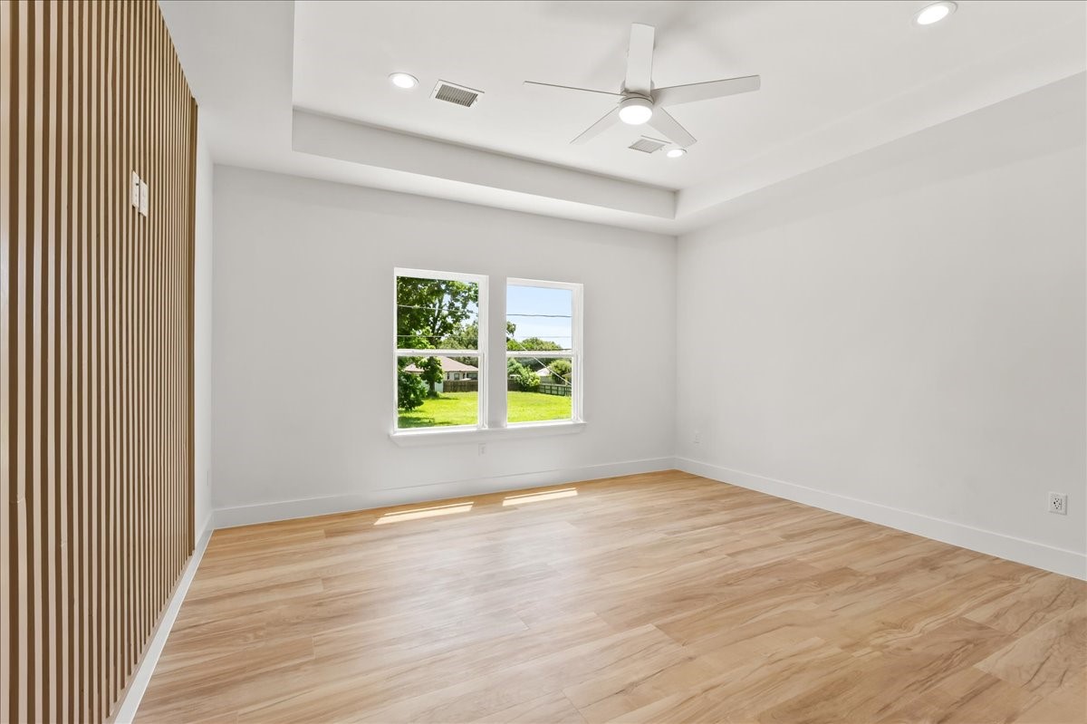 Unit A - Luxurious primary suite. Accent Wall design may vary. Pictures are from a previous build.